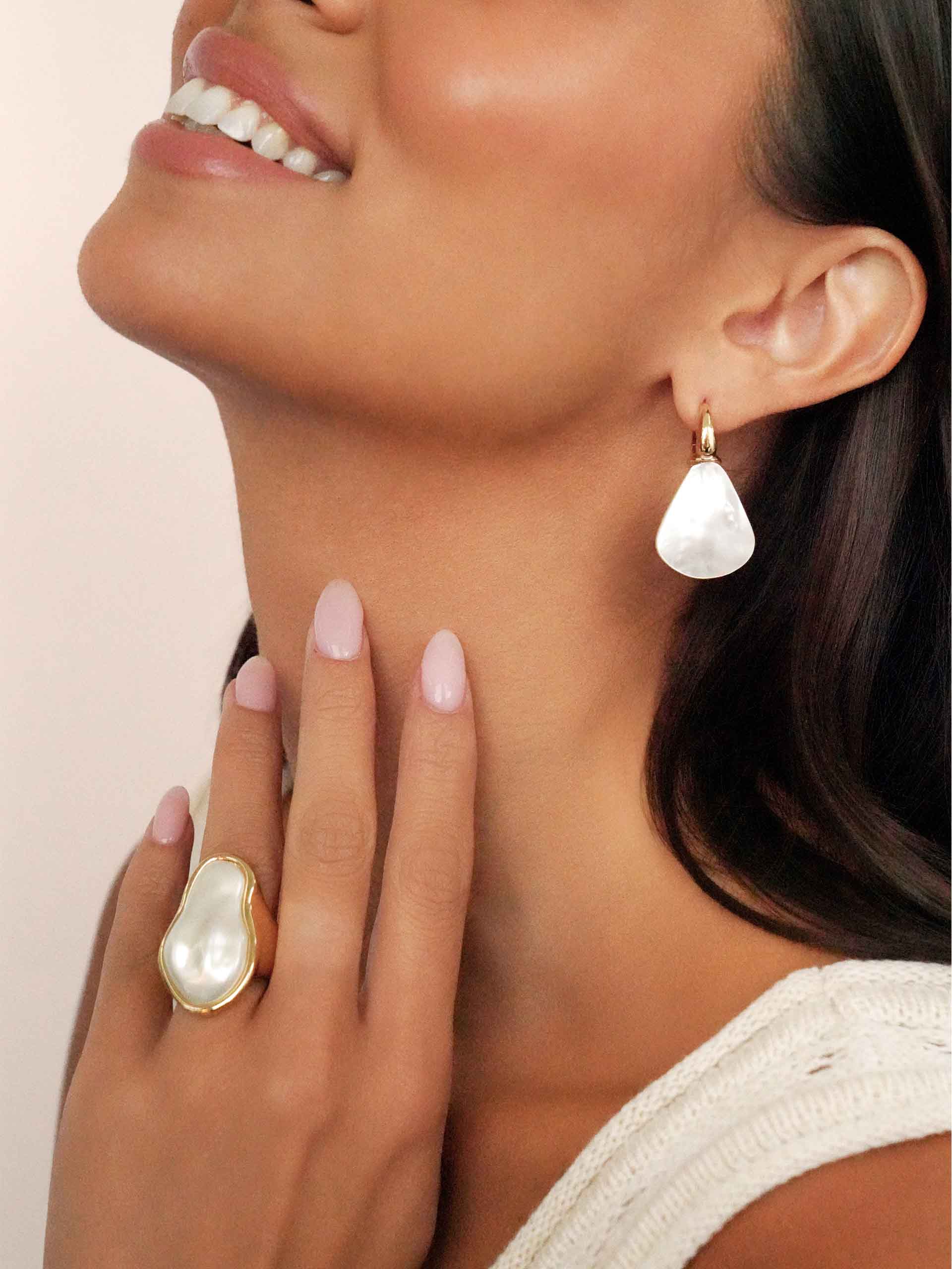 Sun-Kissed Pearl Earrings on model 2