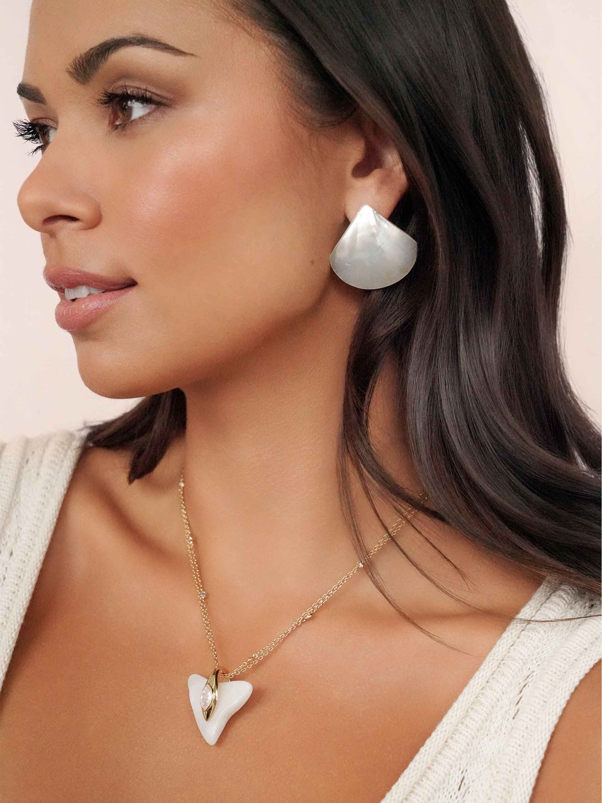 Rising Tide Pearl Studs on model 3