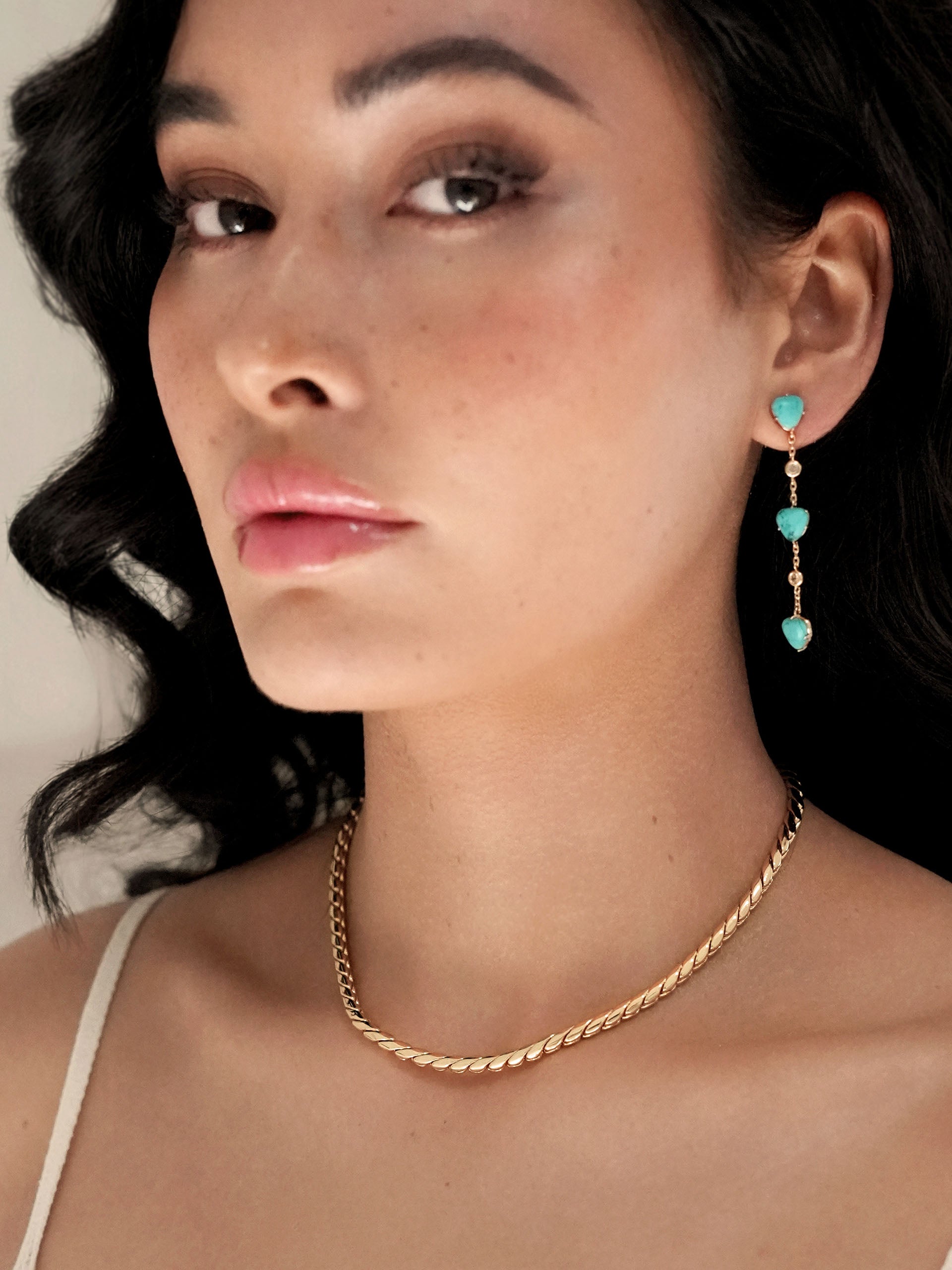 Turquoise Solstice Dangle Earrings on model 3