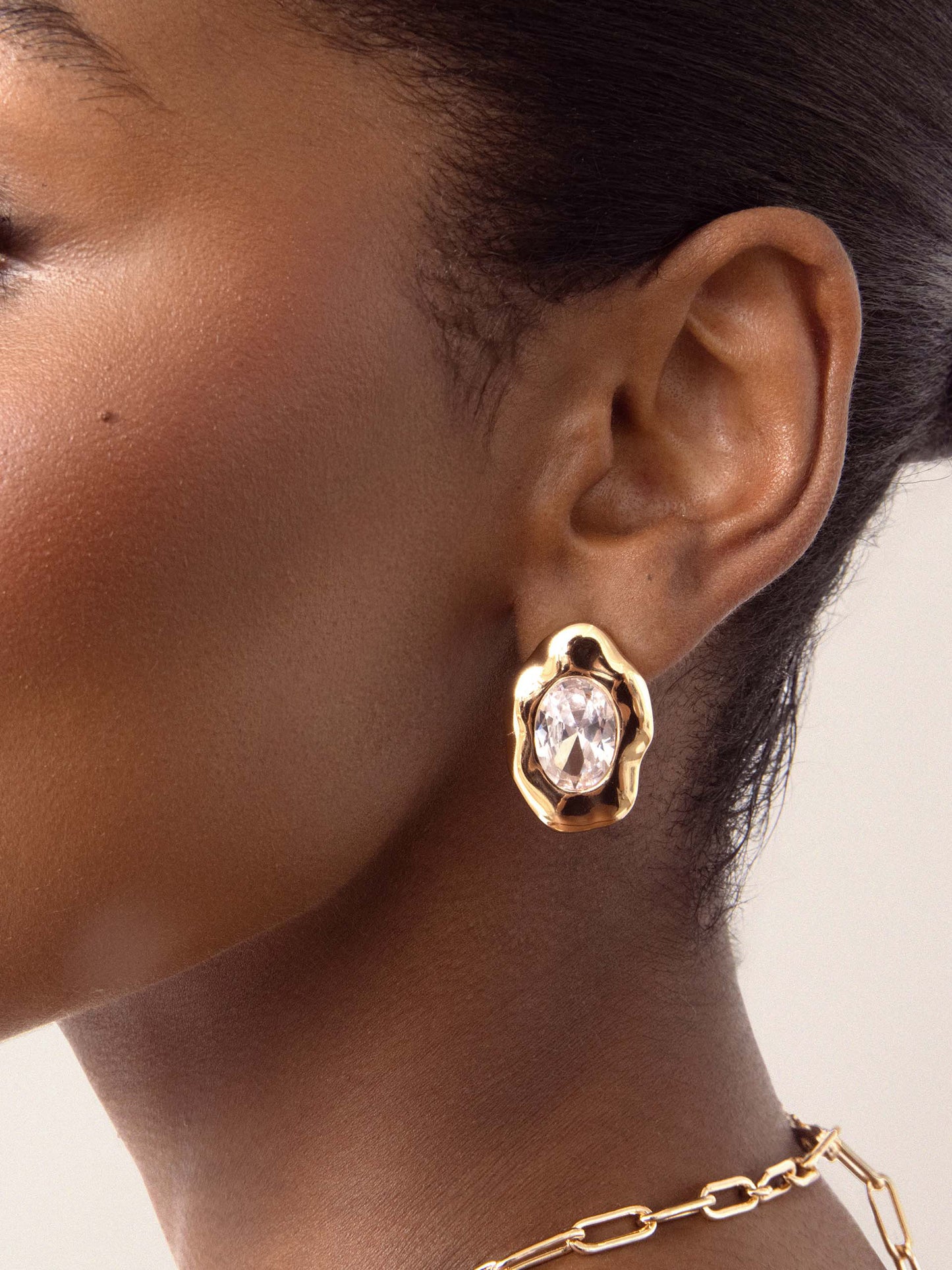 Molten Glow Crystal Studs Clear Crystal with 18k Gold Plating on model 3