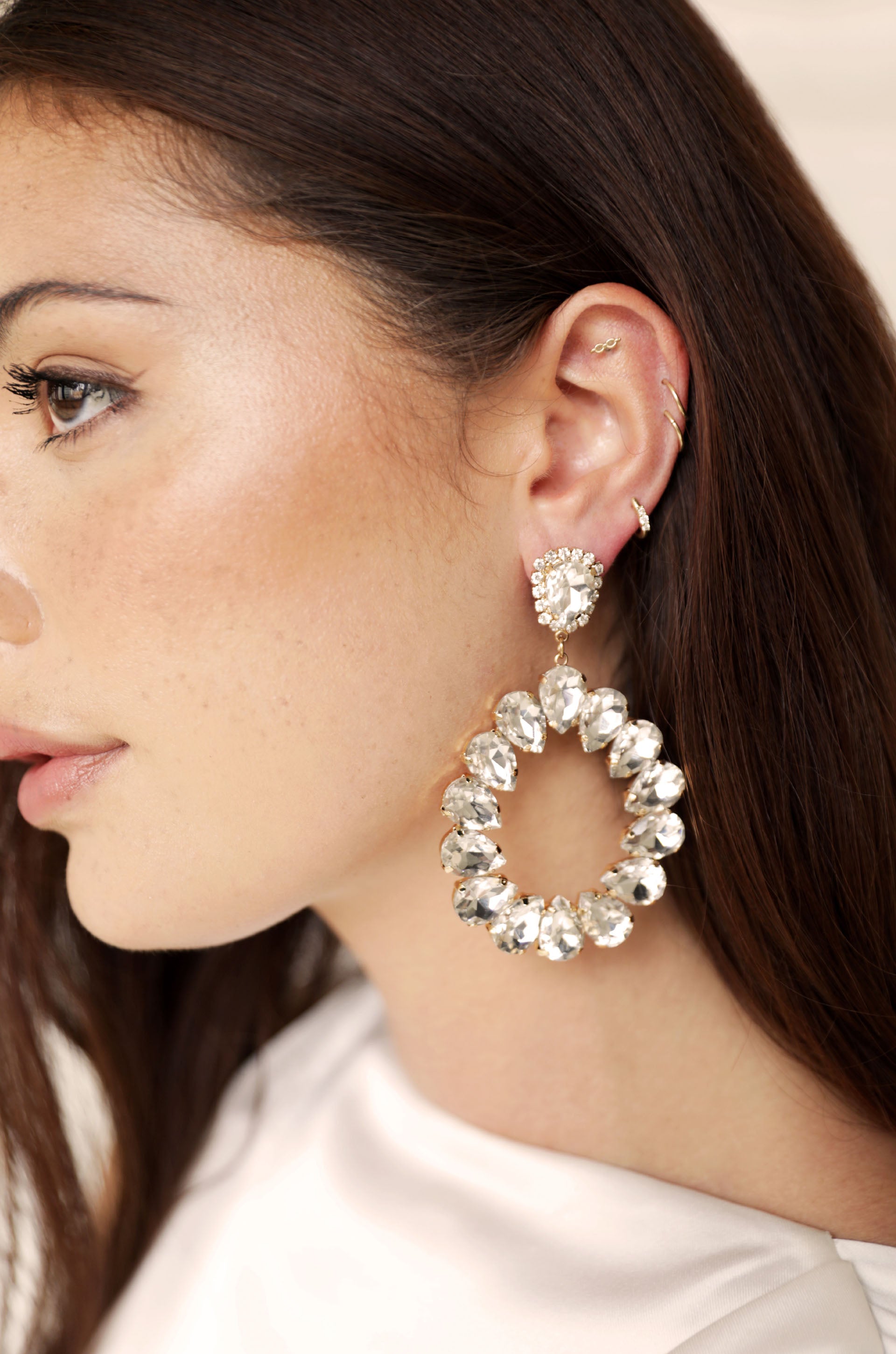 Ring It In Crystal Earrings on model