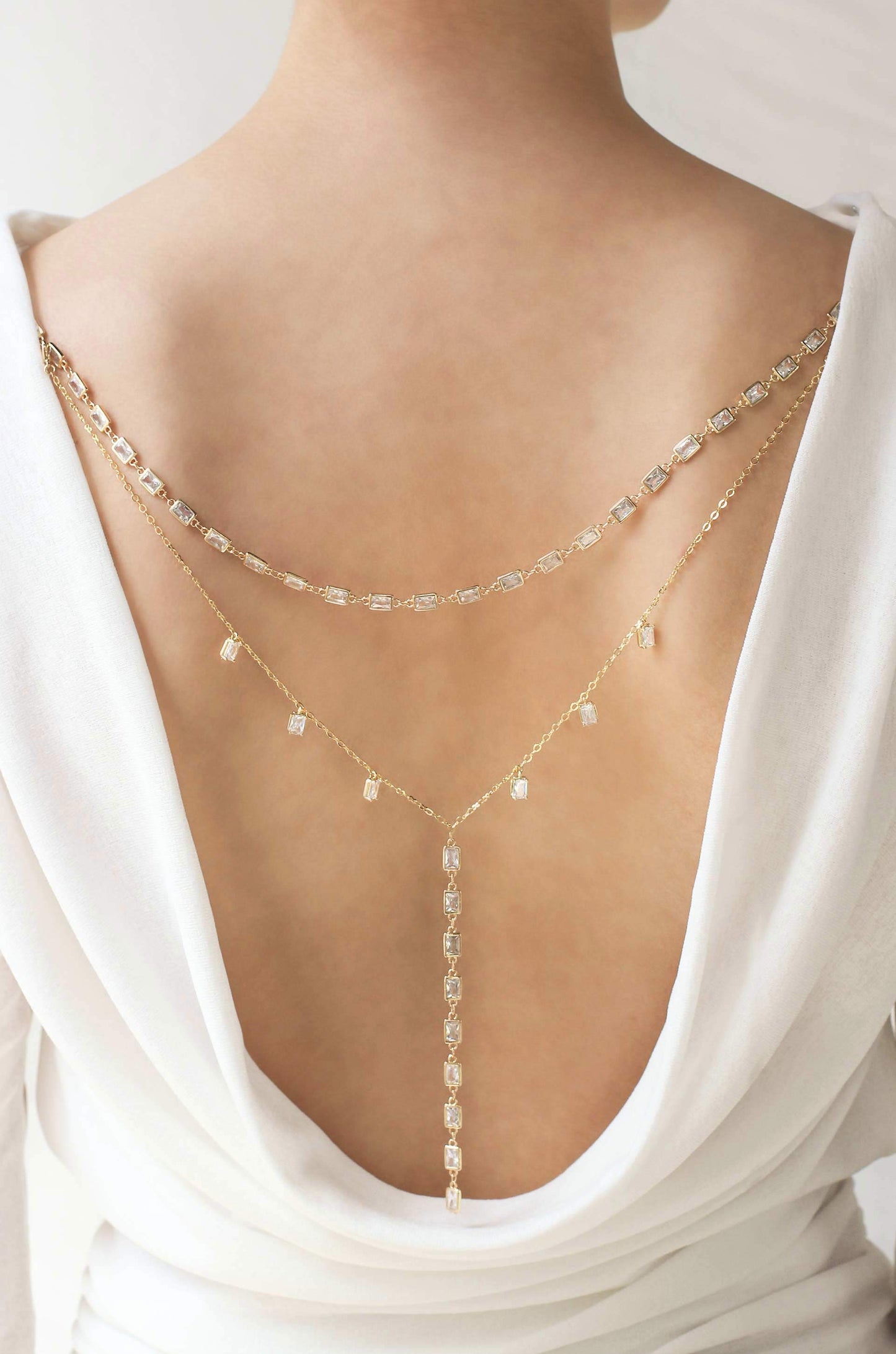 Pure Elegance Crystal Drop Back Necklace on model 2