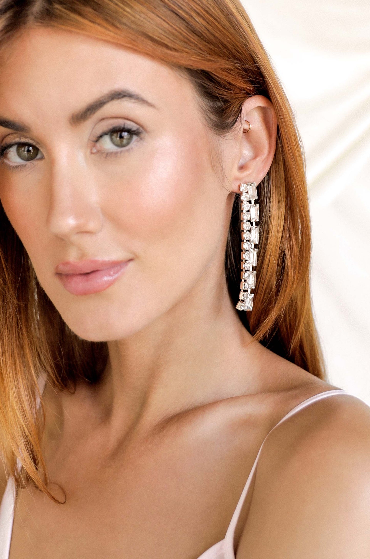 Date Night Crystal Drop 18k Gold Plated Earrings in clear on model