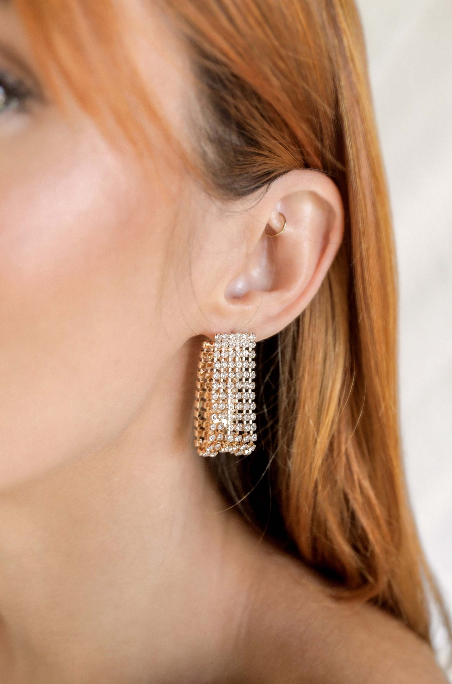 Crystal Loop Around Earrings on model