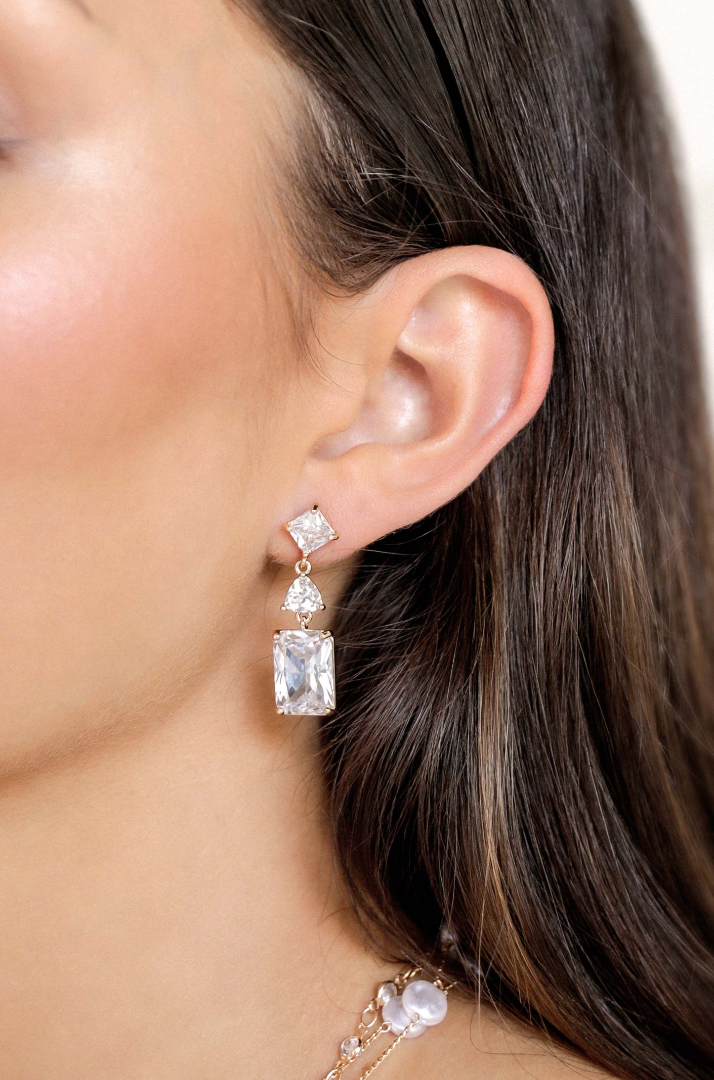 Reflective Crystal Dangle Earrings on model 2