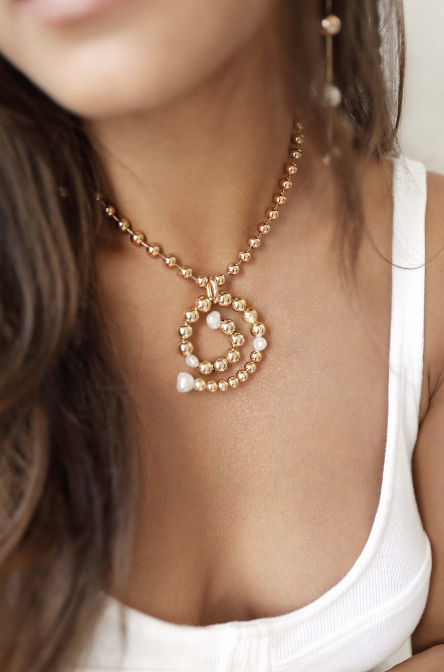 Golden Pearl Swirl 18k Gold Plated Necklace on model