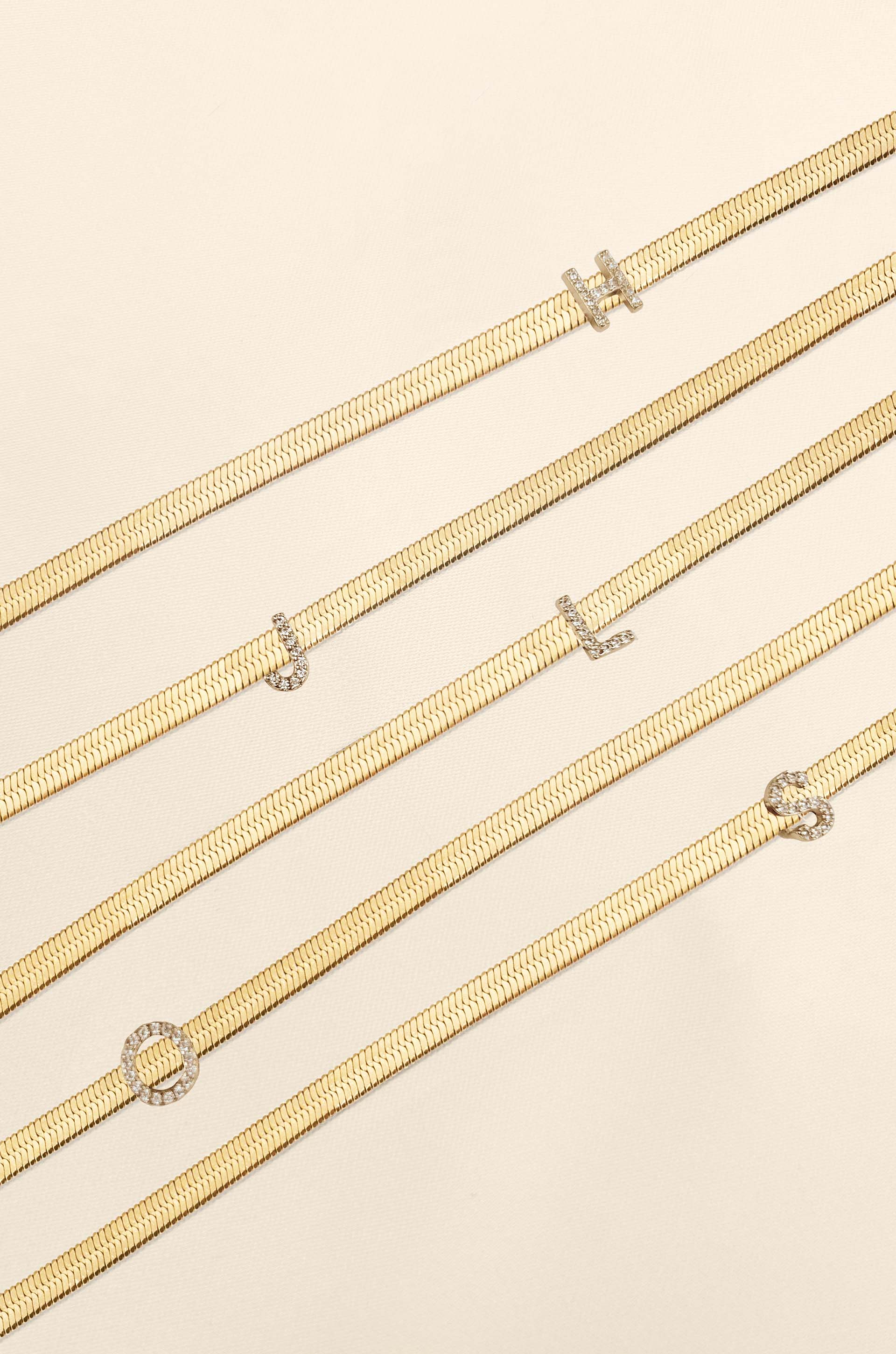 Initial Herringbone Necklace flat lay
