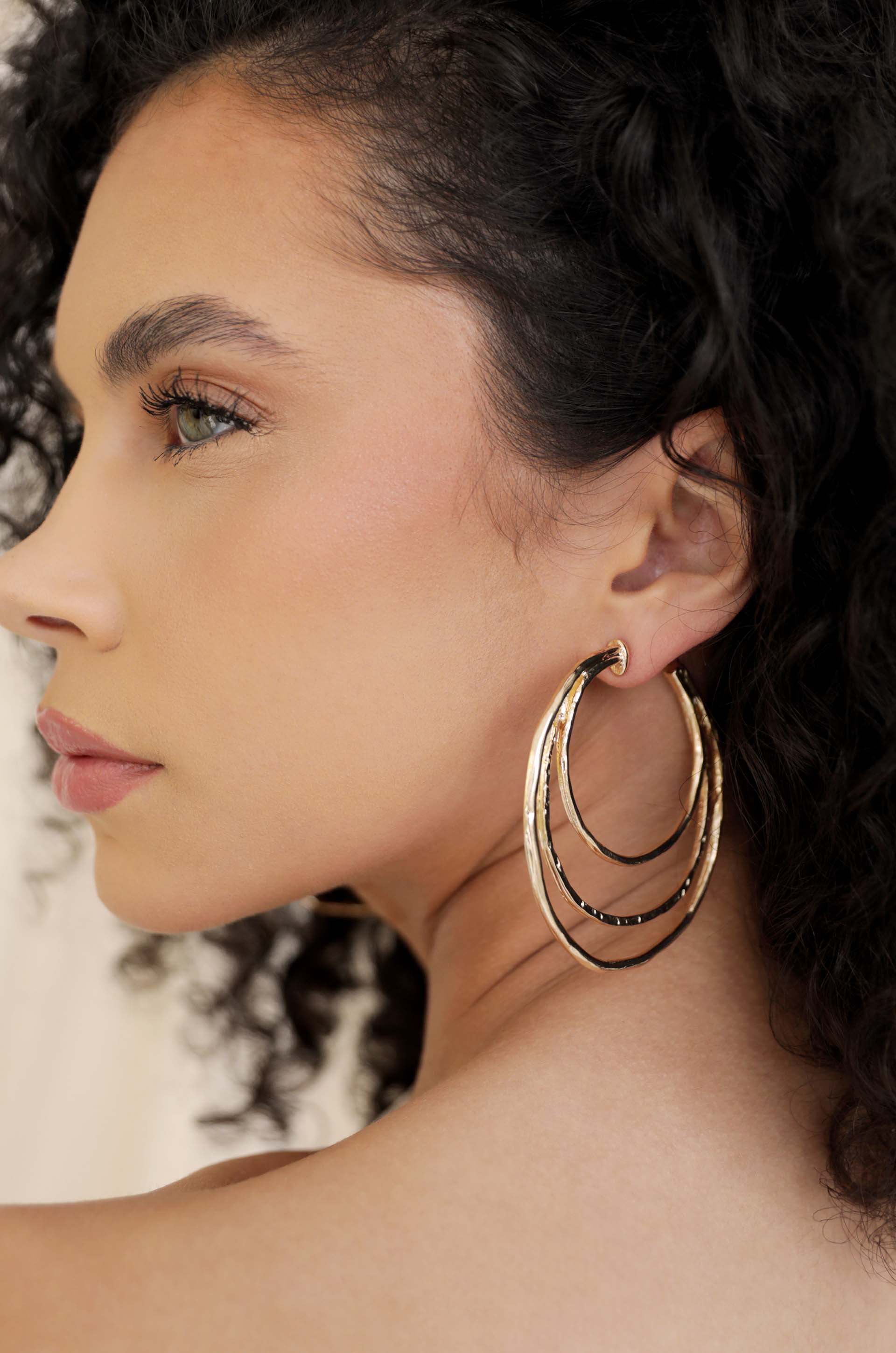 Handworked Hoop Earrings on model