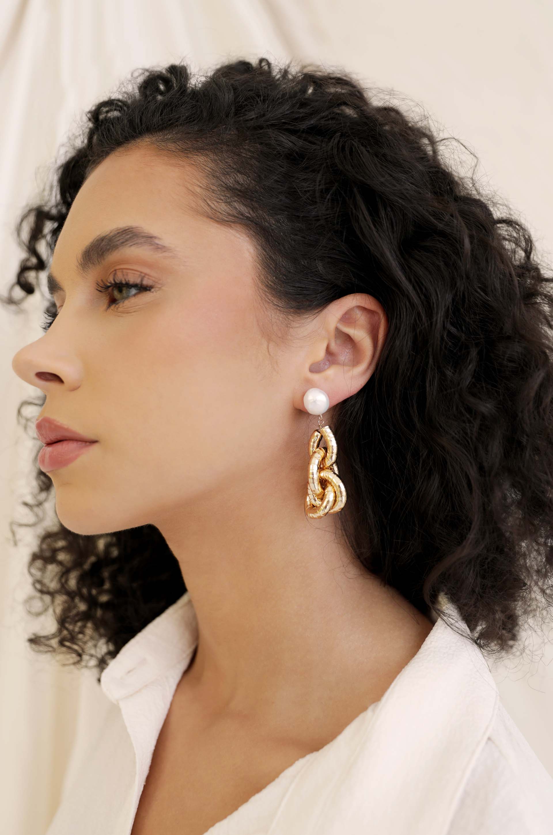 Liquid Gold Pearl Drop Earrings on model 2