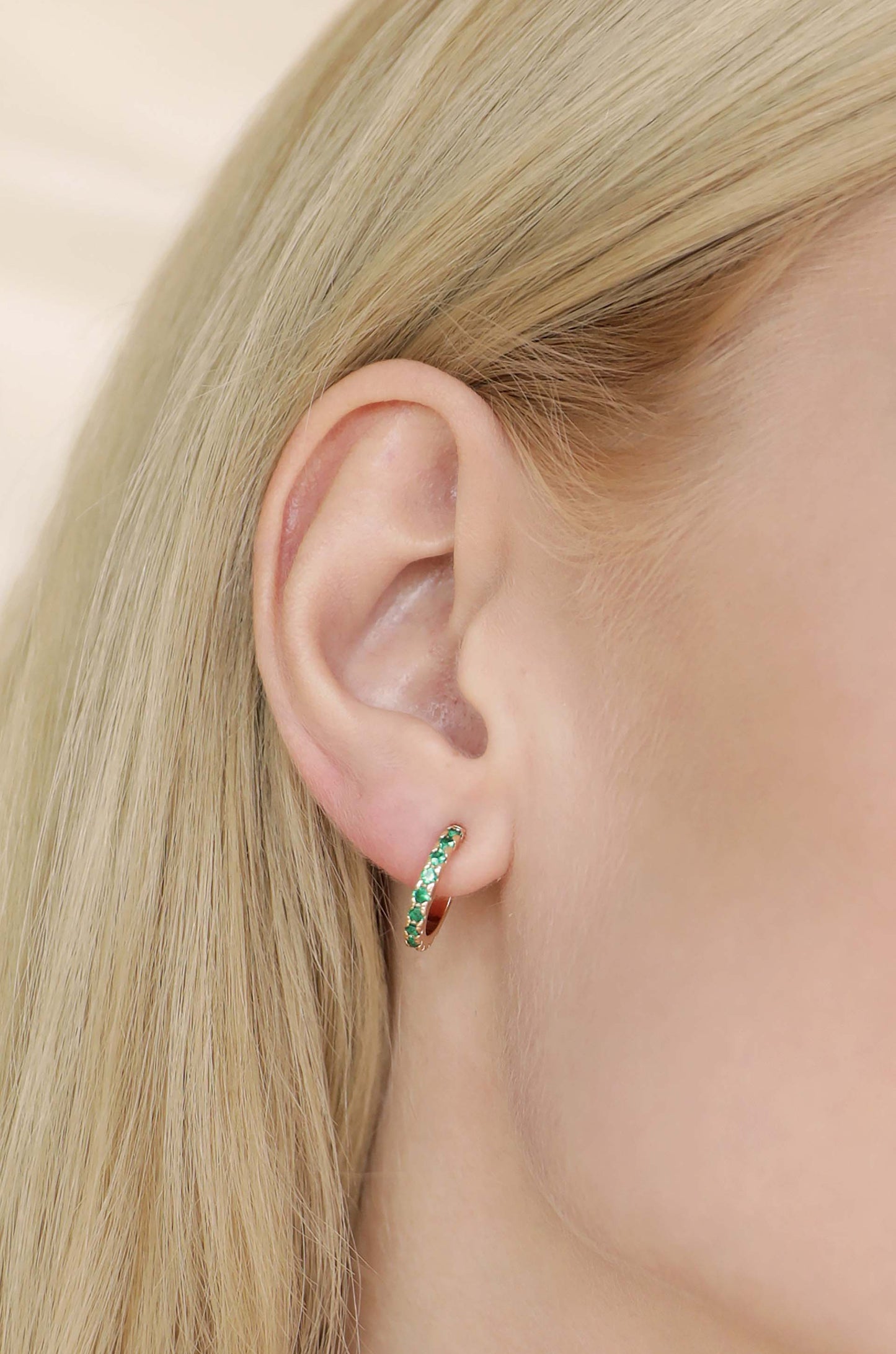 Colorful Crystal 18k Gold Plated Huggie Earrings in green on model
