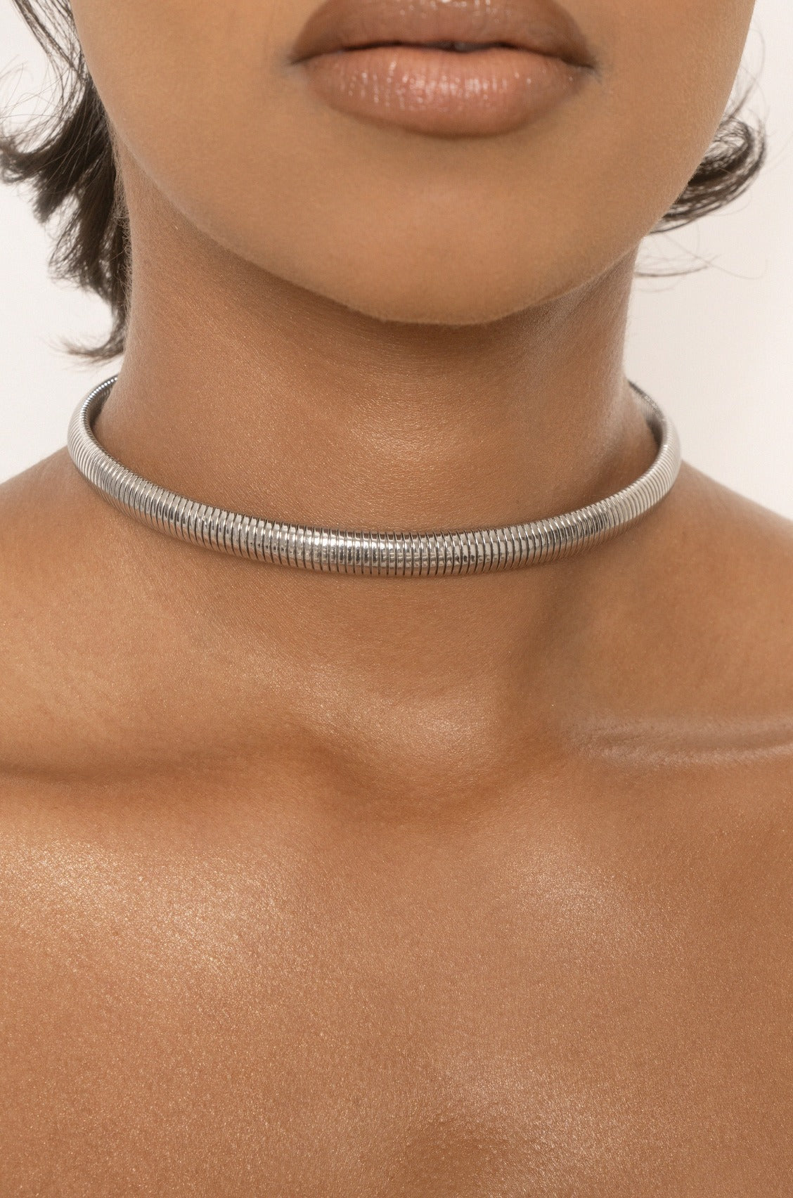 Your Essential Flex Snake Chain 18k Gold Plated Necklace in rhodium on model