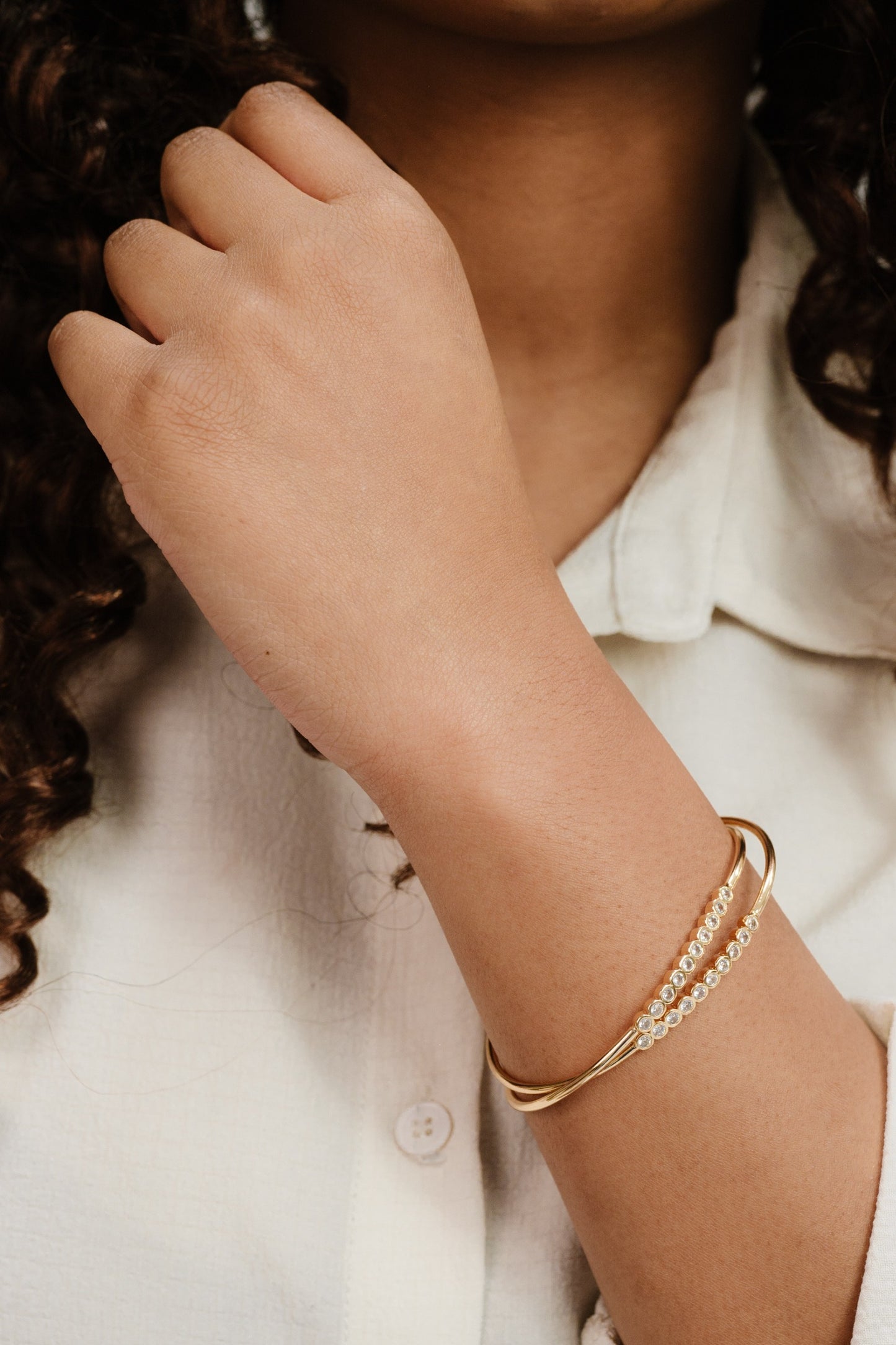 Double Take Crystal 18k Gold Plated Cuff Set on model 3