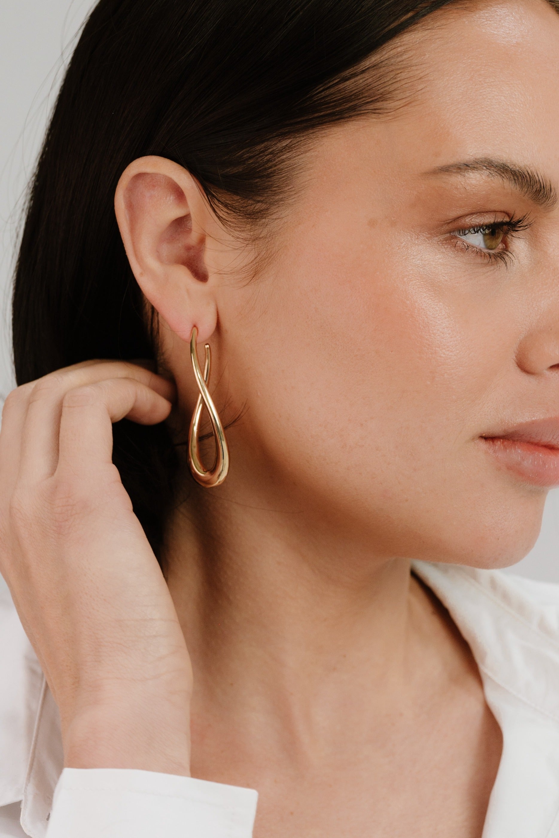 Oblong Abstract Hoop Earring on model 5