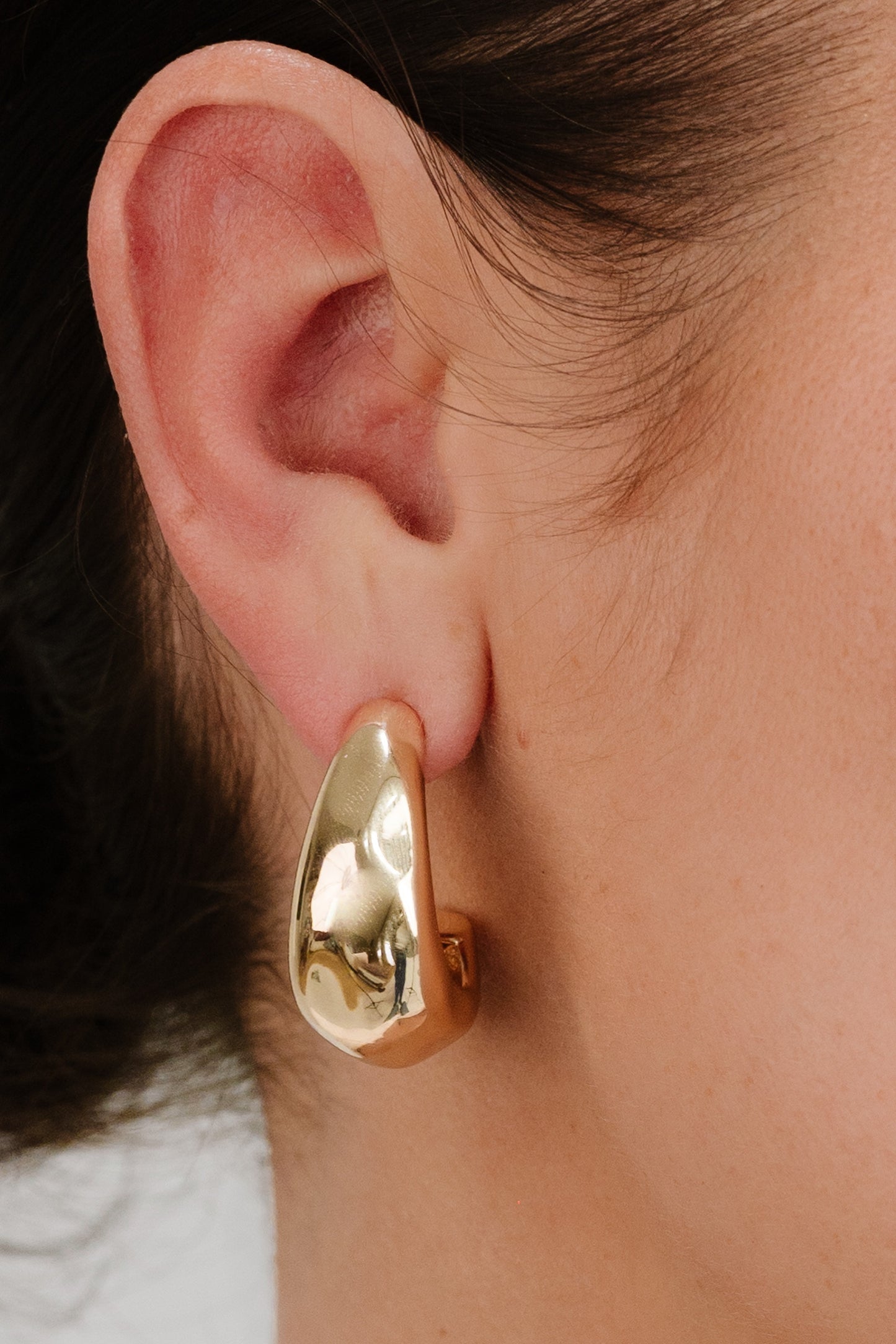 True Golden Hoop Earrings on model
