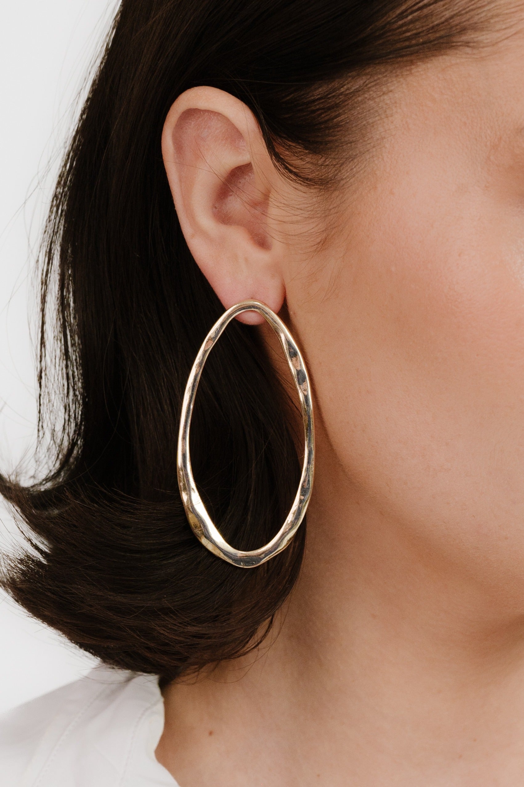 Hammered 18k Gold Plated Large Oval Earrings on model
