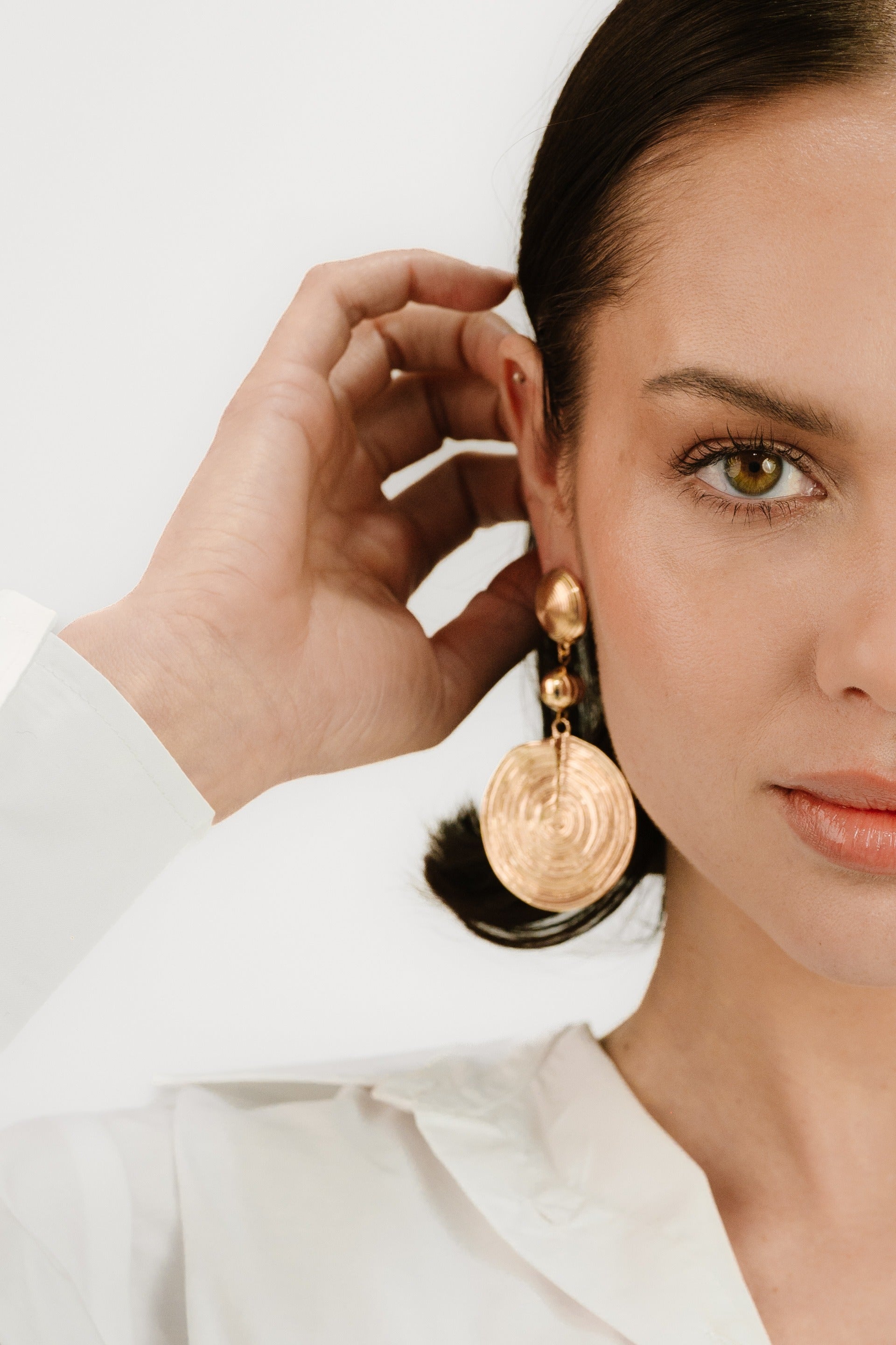 Textured Disc 18k Gold Plated Statement Earrings on model 3