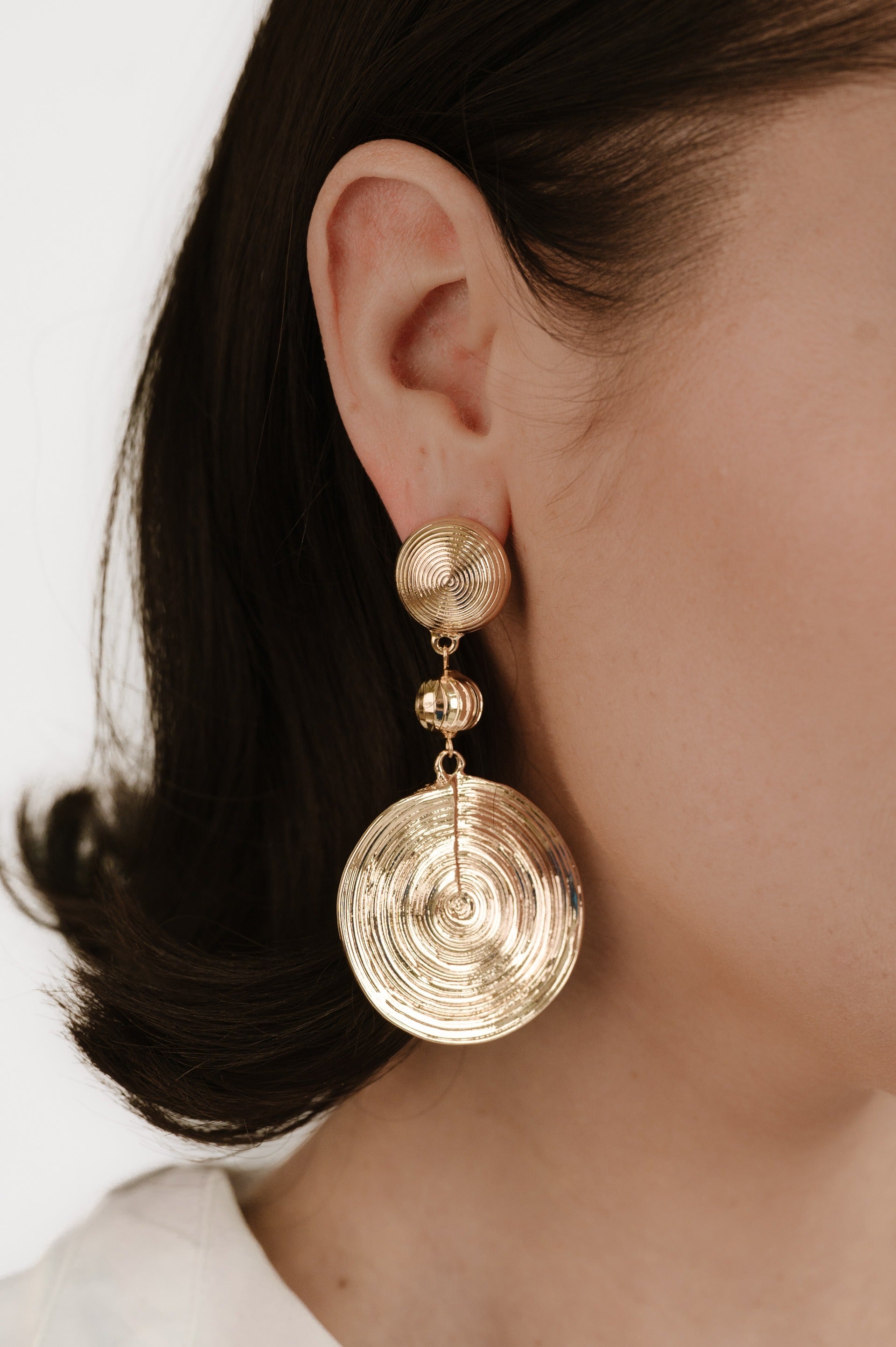 Textured Disc 18k Gold Plated Statement Earrings on model 4