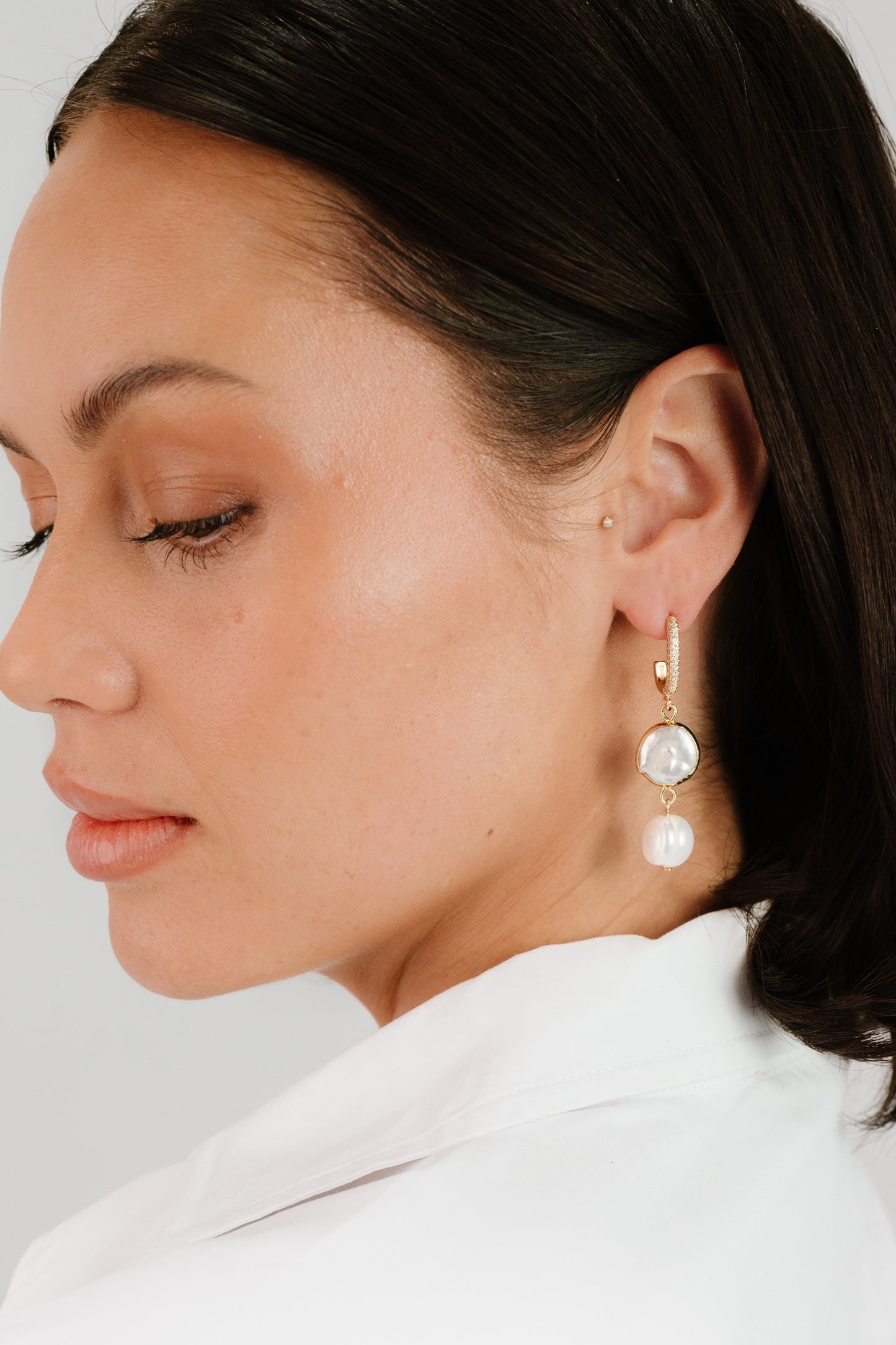 Dangling Freshwater Pearl Huggie Hoop Earrings on model 2