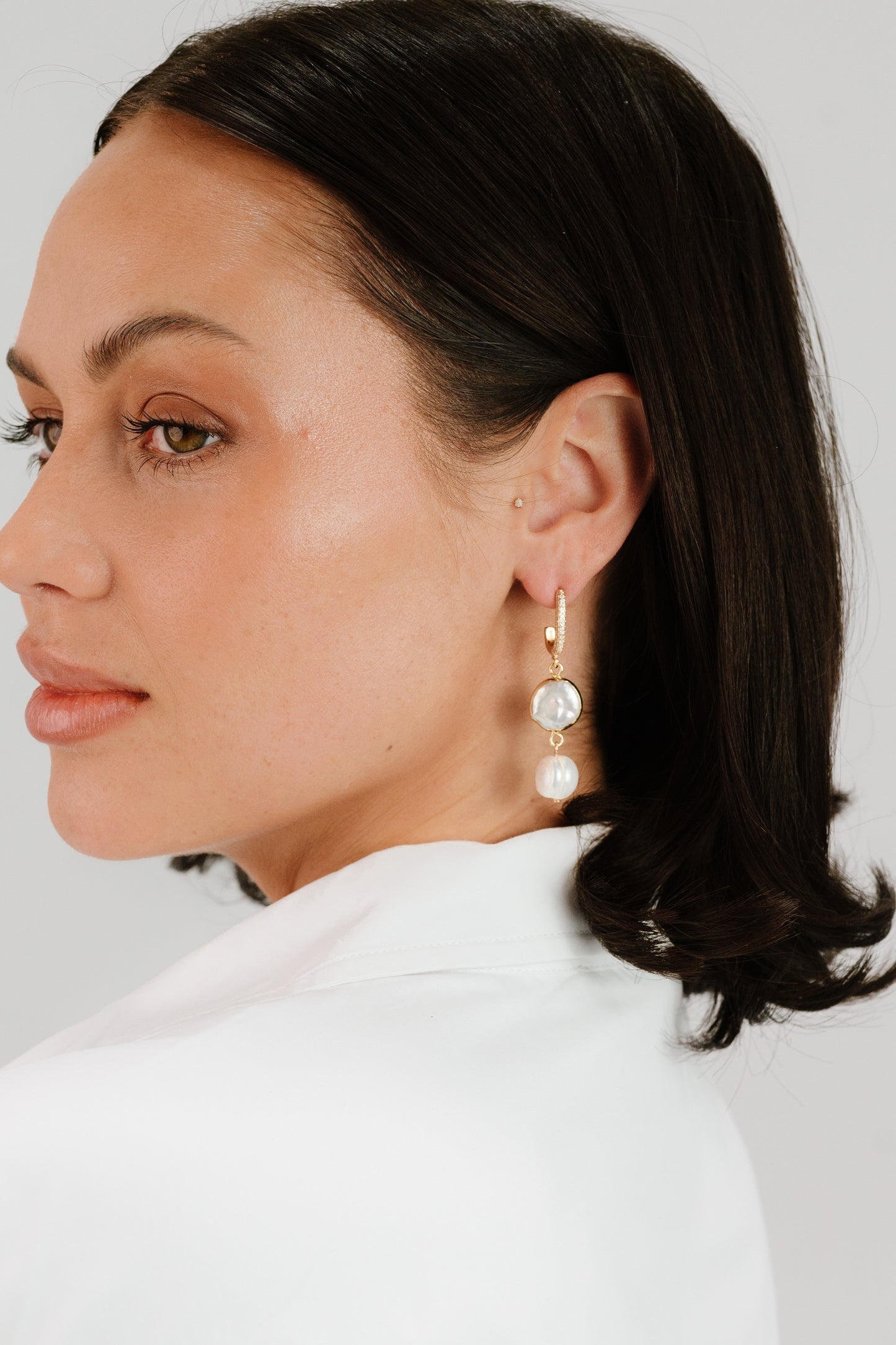 Dangling Freshwater Pearl Huggie Hoop Earrings on model 4