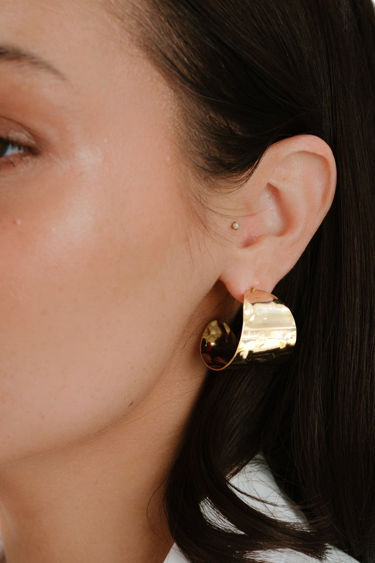 Hammered 18k Gold Plated Cupped Hoop Earrings on model