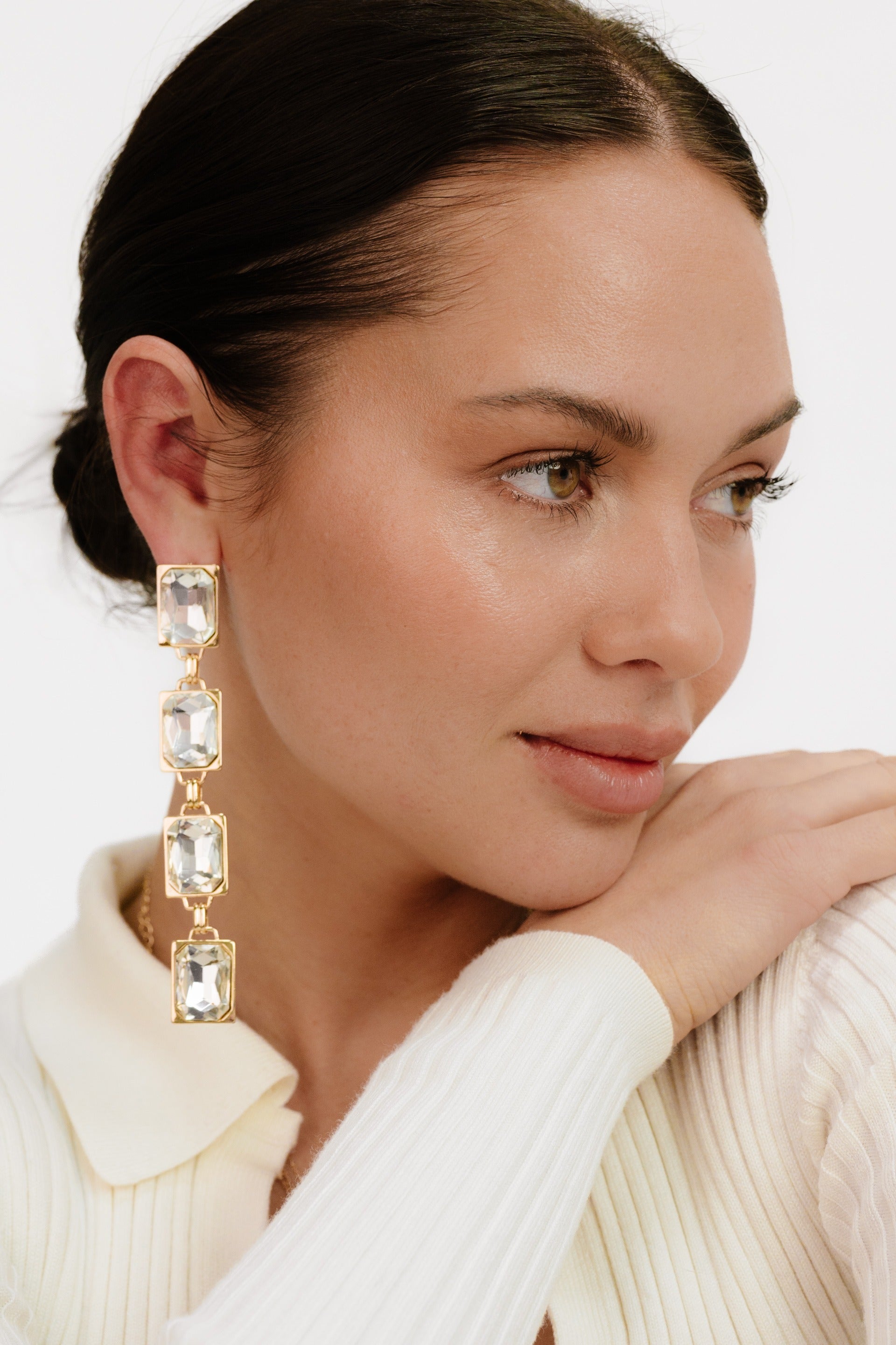 Four Crystal Stone Drop 18k Gold Plated Earrings on model 3