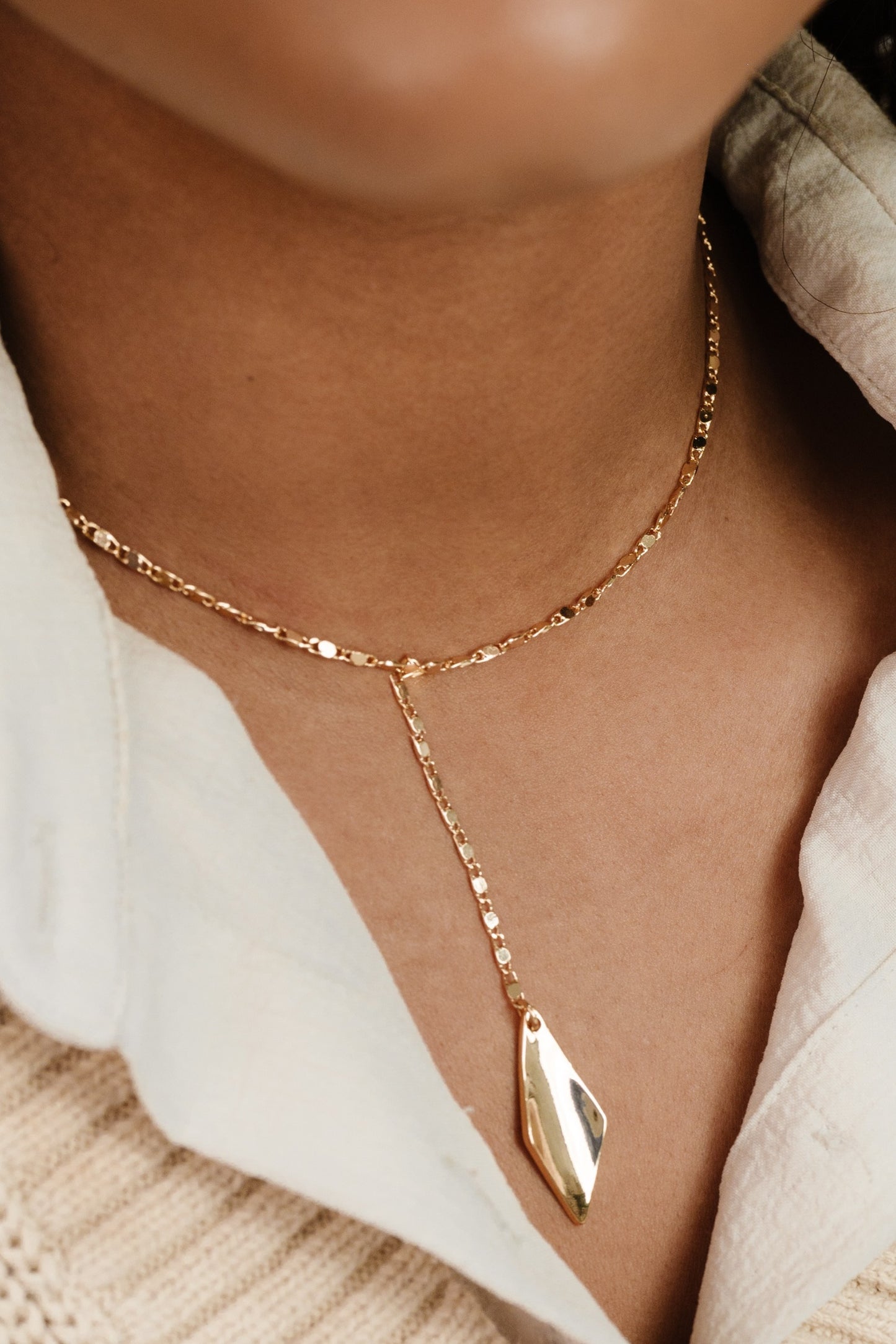 Kite Drop Pendant Necklace on model