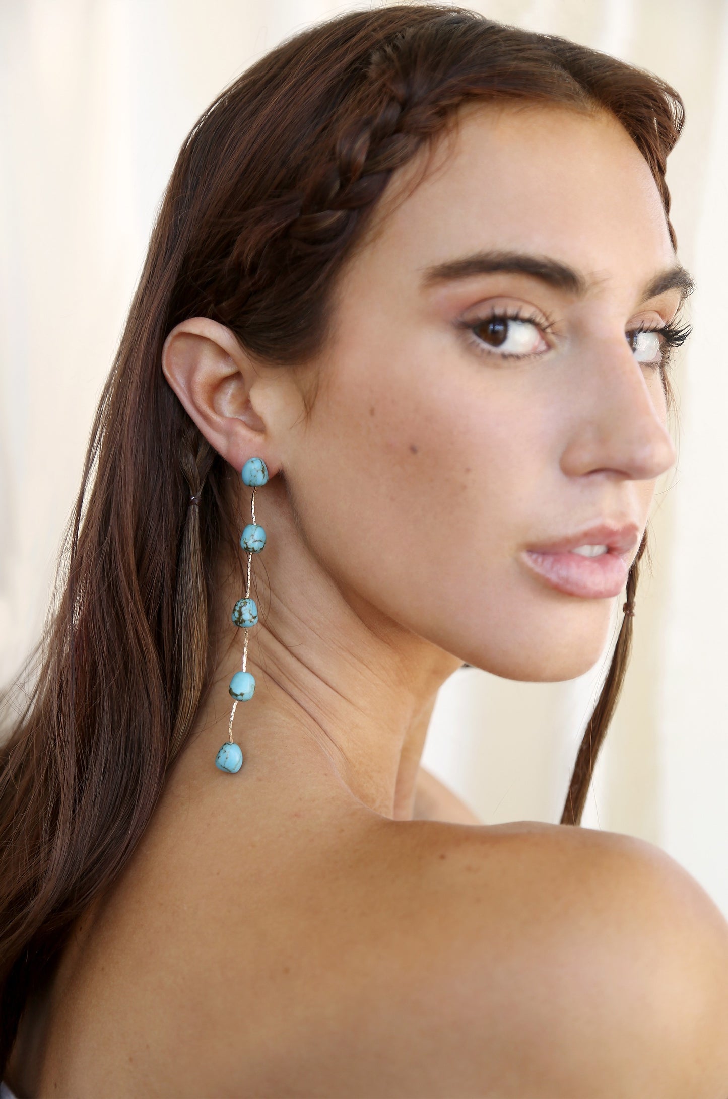 Dripping Turquoise Delicate Drop Earrings on model 2