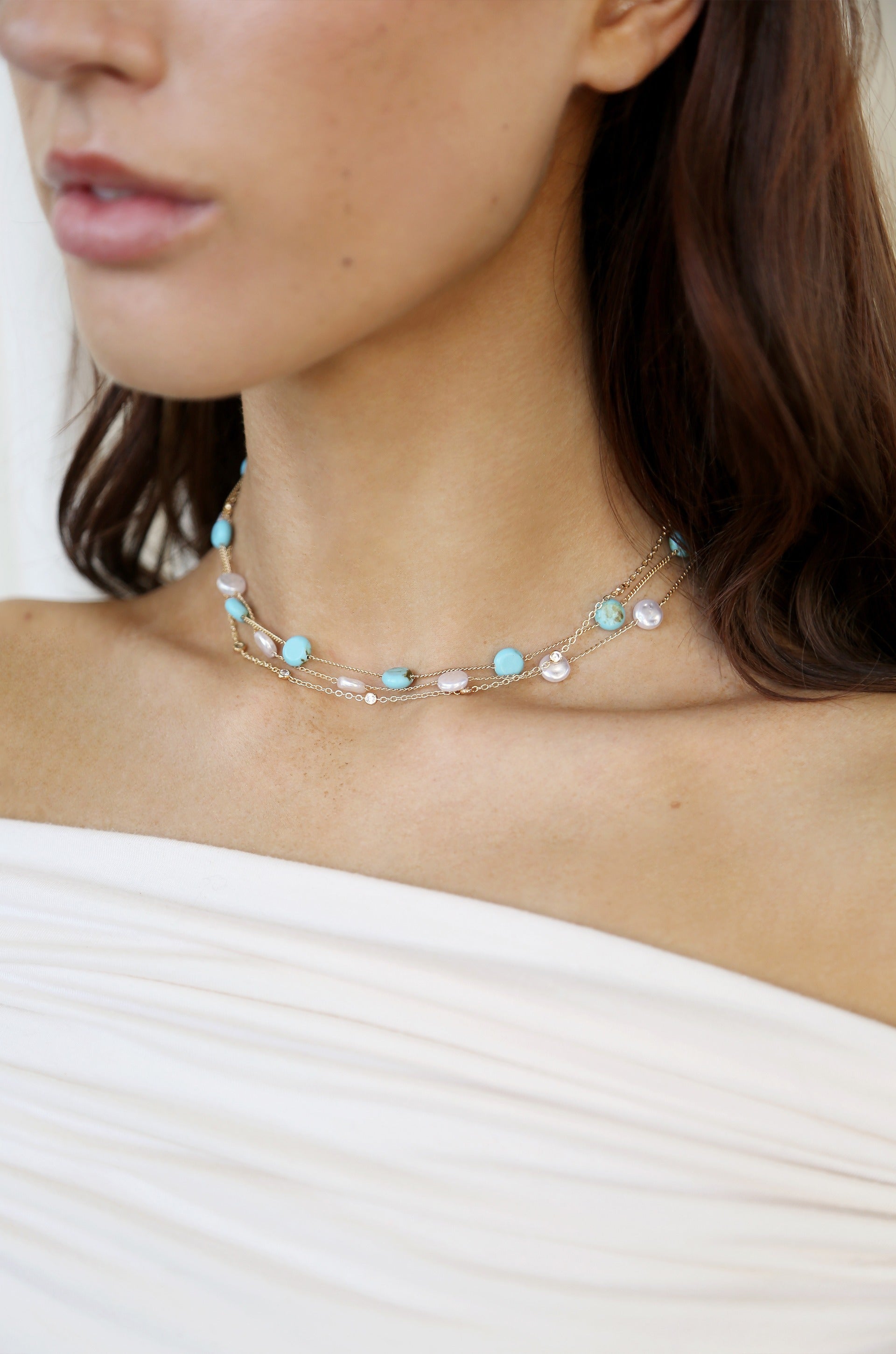 Dressed in Turquoise & Pearls Layered 18k Gold Plated Necklace on model 2