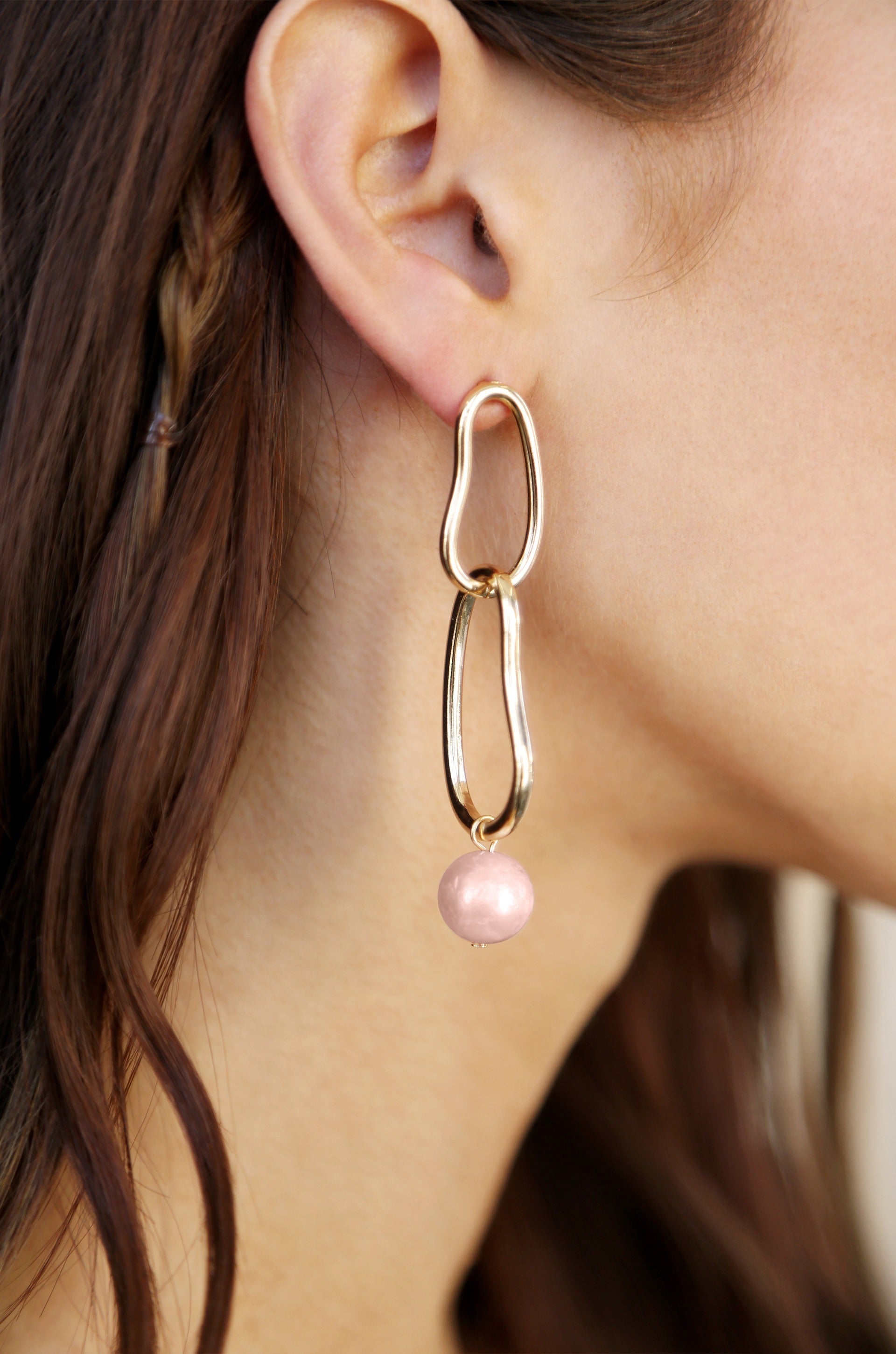 Mara Dangle Pearl Earrings in pink model