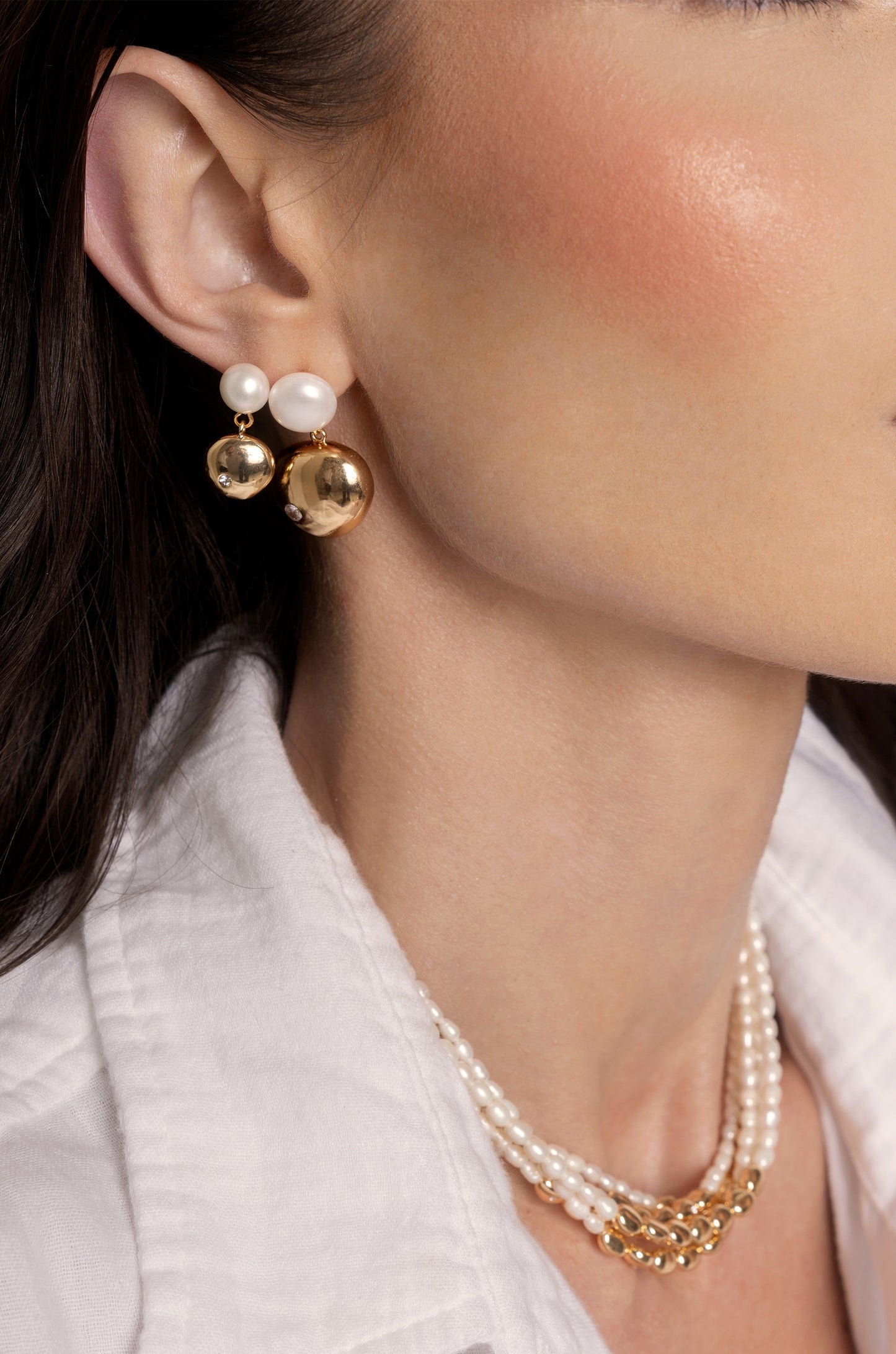 Small Pebble and Pearl Dangle Earrings on model