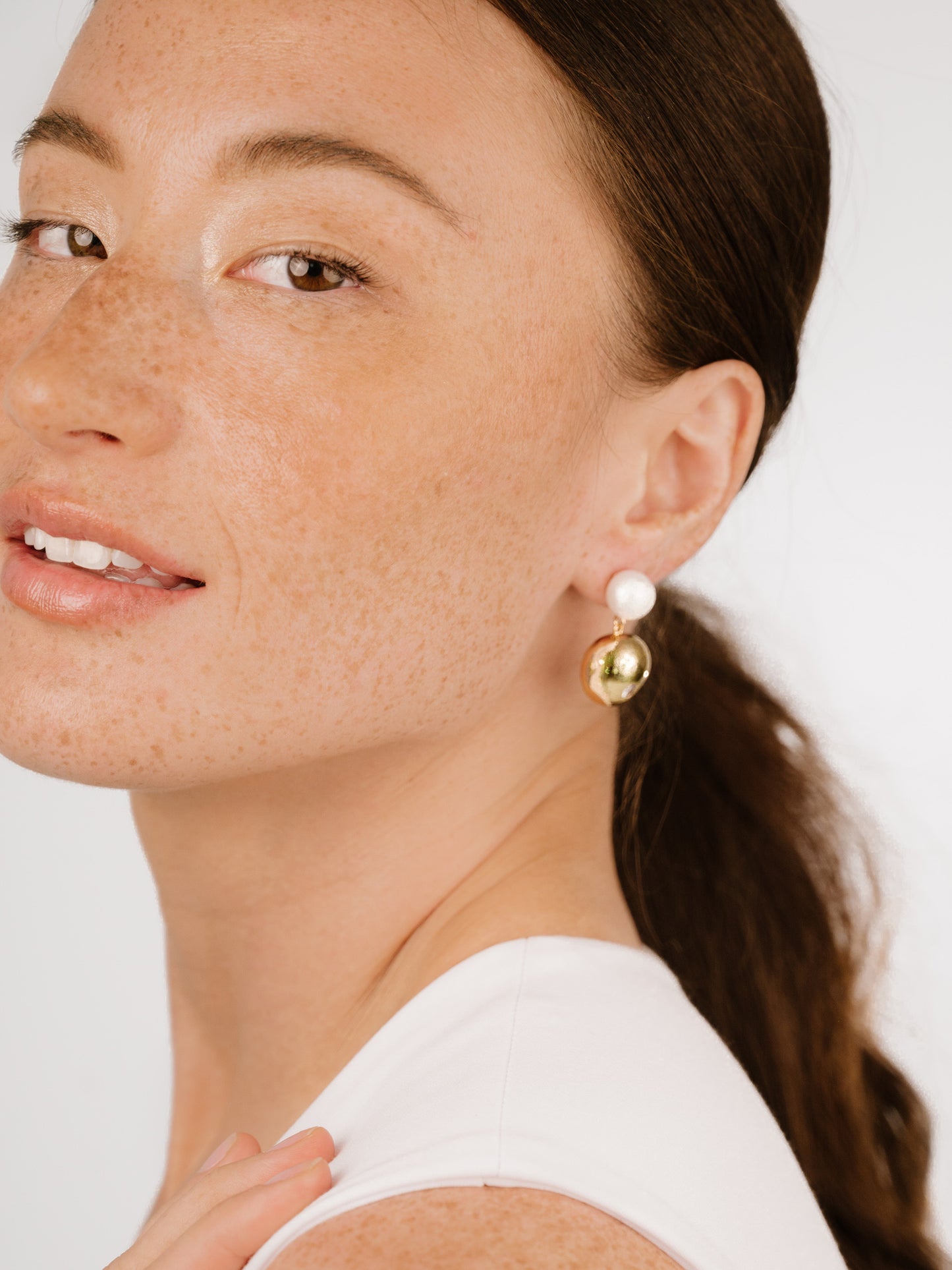 Statement Pebble and Pearl Dangle Earrings on model 3