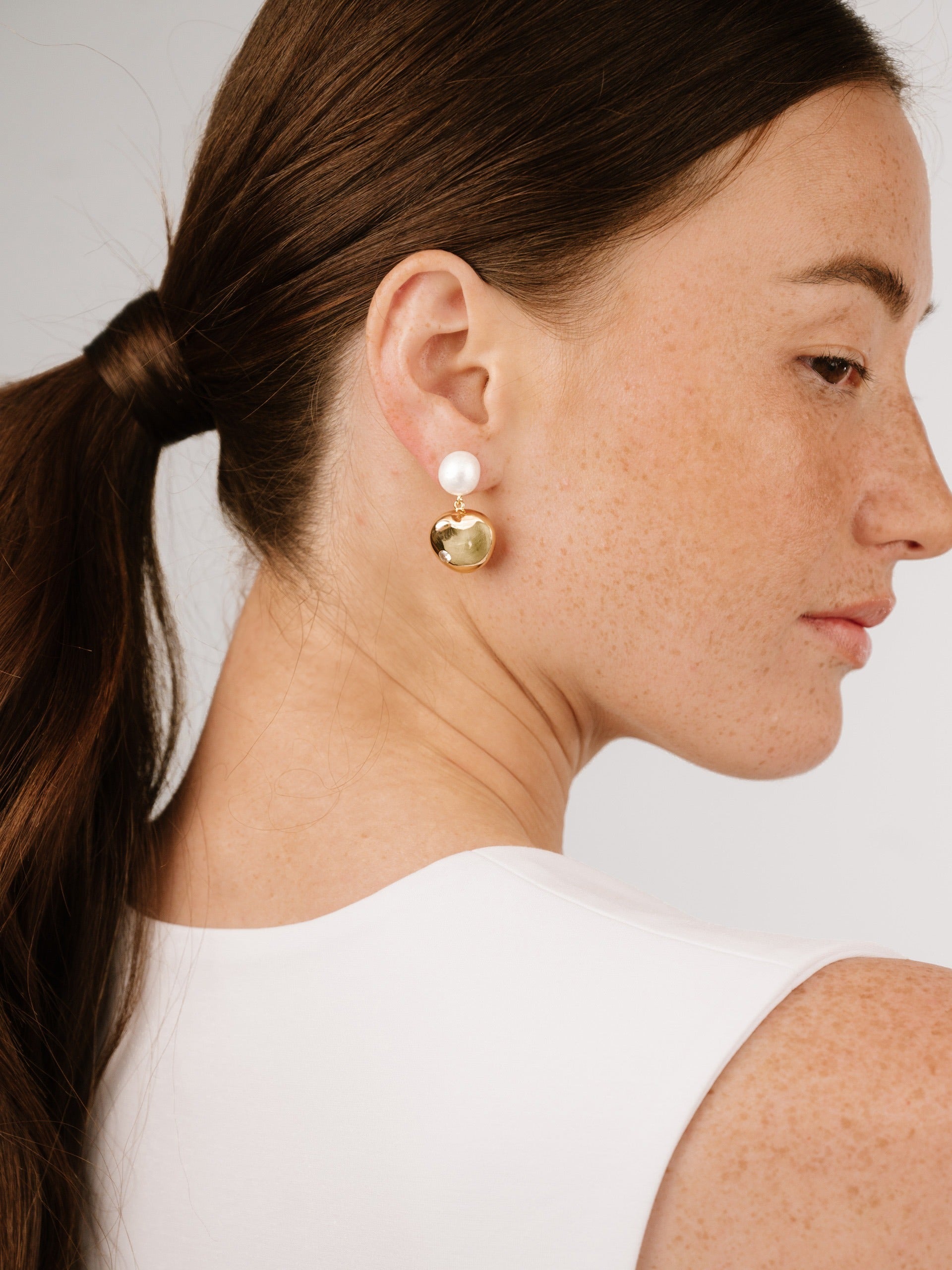 Statement Pebble and Pearl Dangle Earrings on model 2