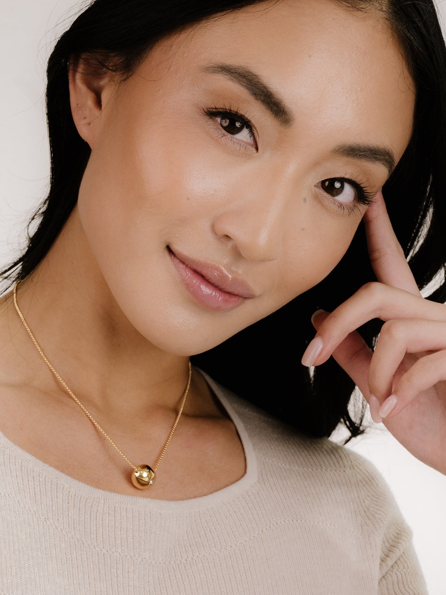 Crystal Dot Pebble Pendant Necklace on model 4
