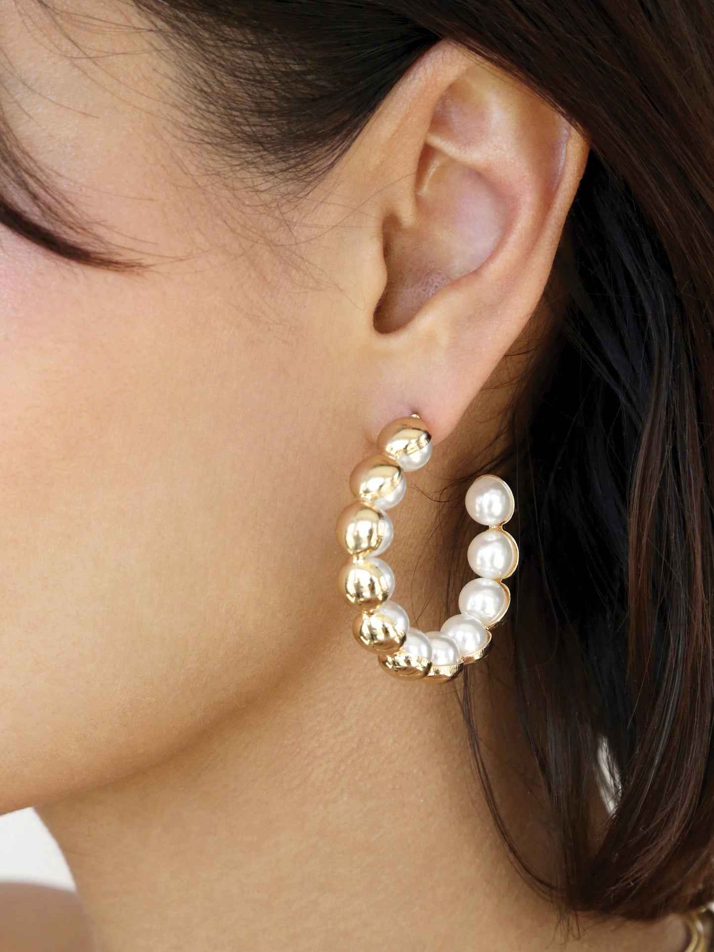 Pearl Inlay and Gold Hoop Earrings on model