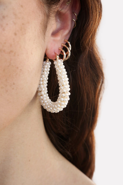Pearl Wrapped Hoop Earrings on model