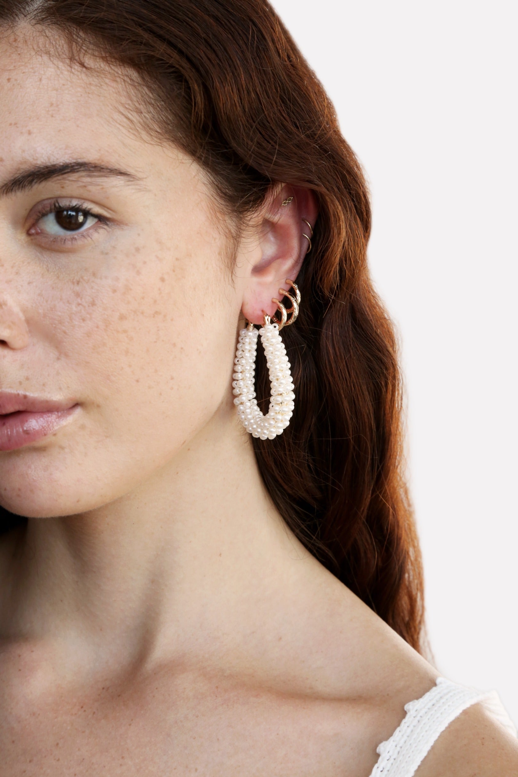 Pearl Wrapped Hoop Earrings on model 2
