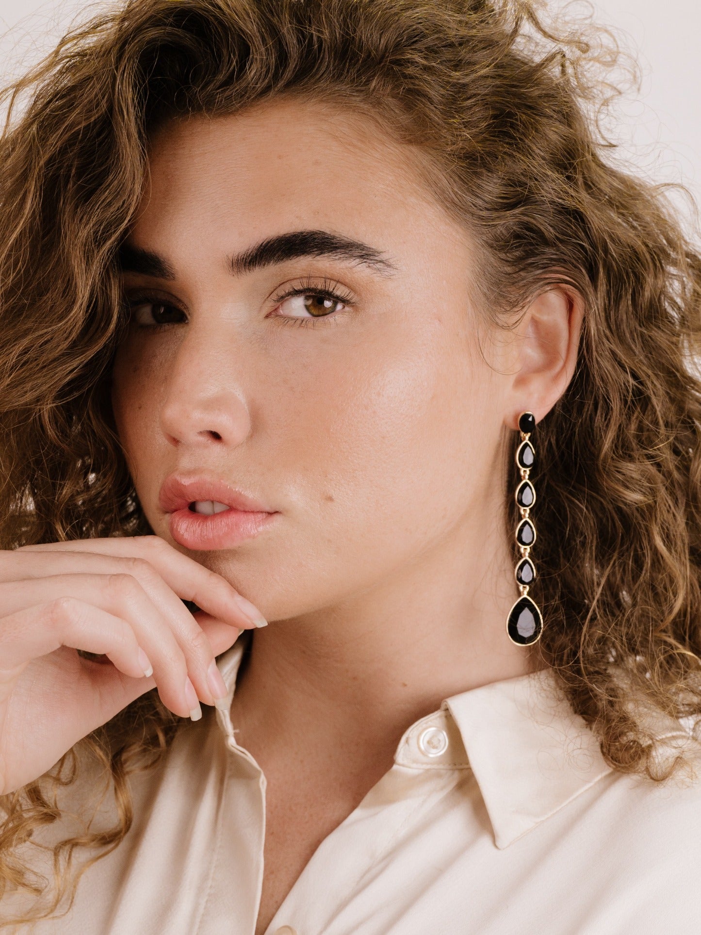 Crystallized Drop Earrings on model 2