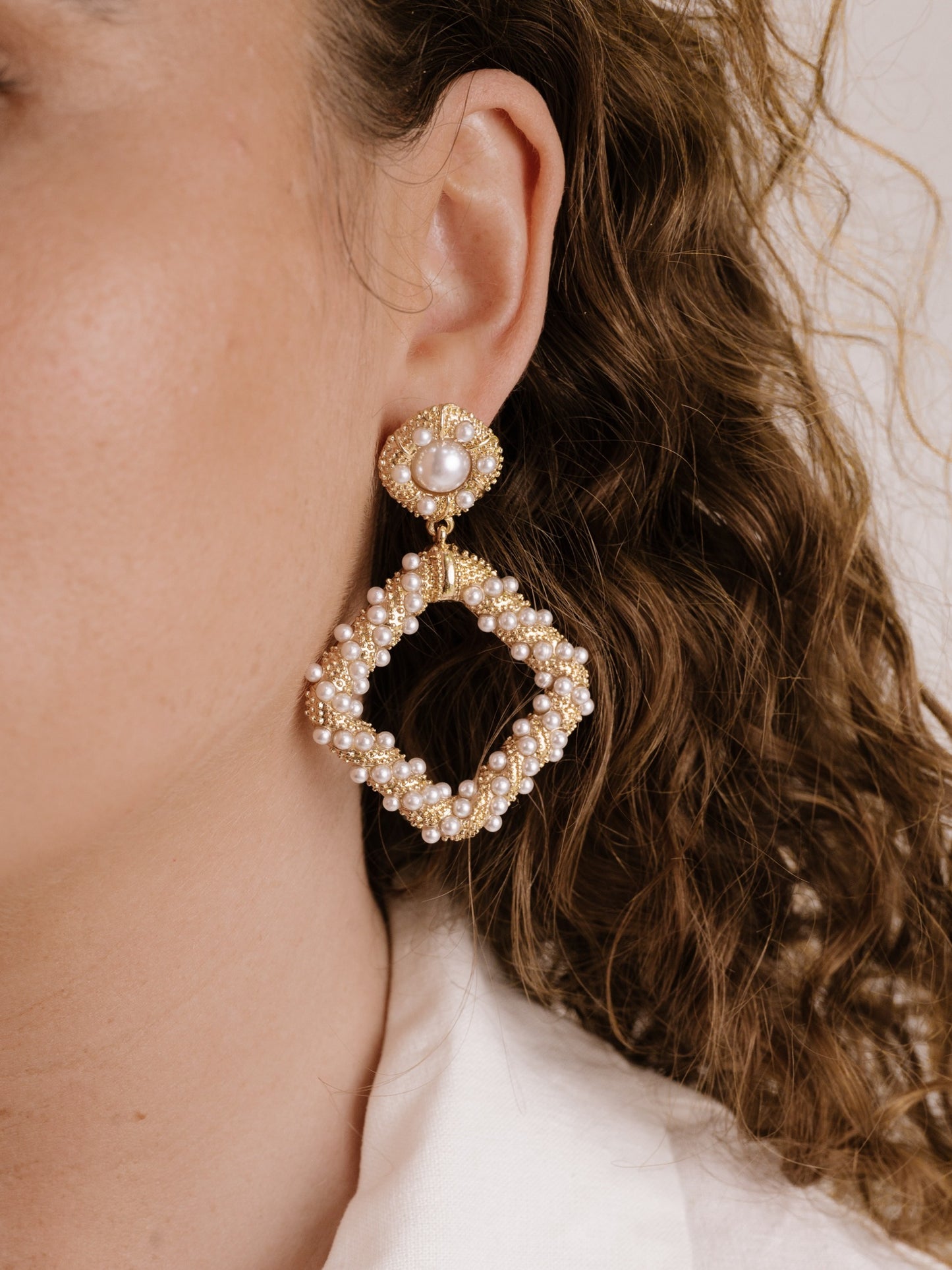 Pearl Knocker Earrings on model 4