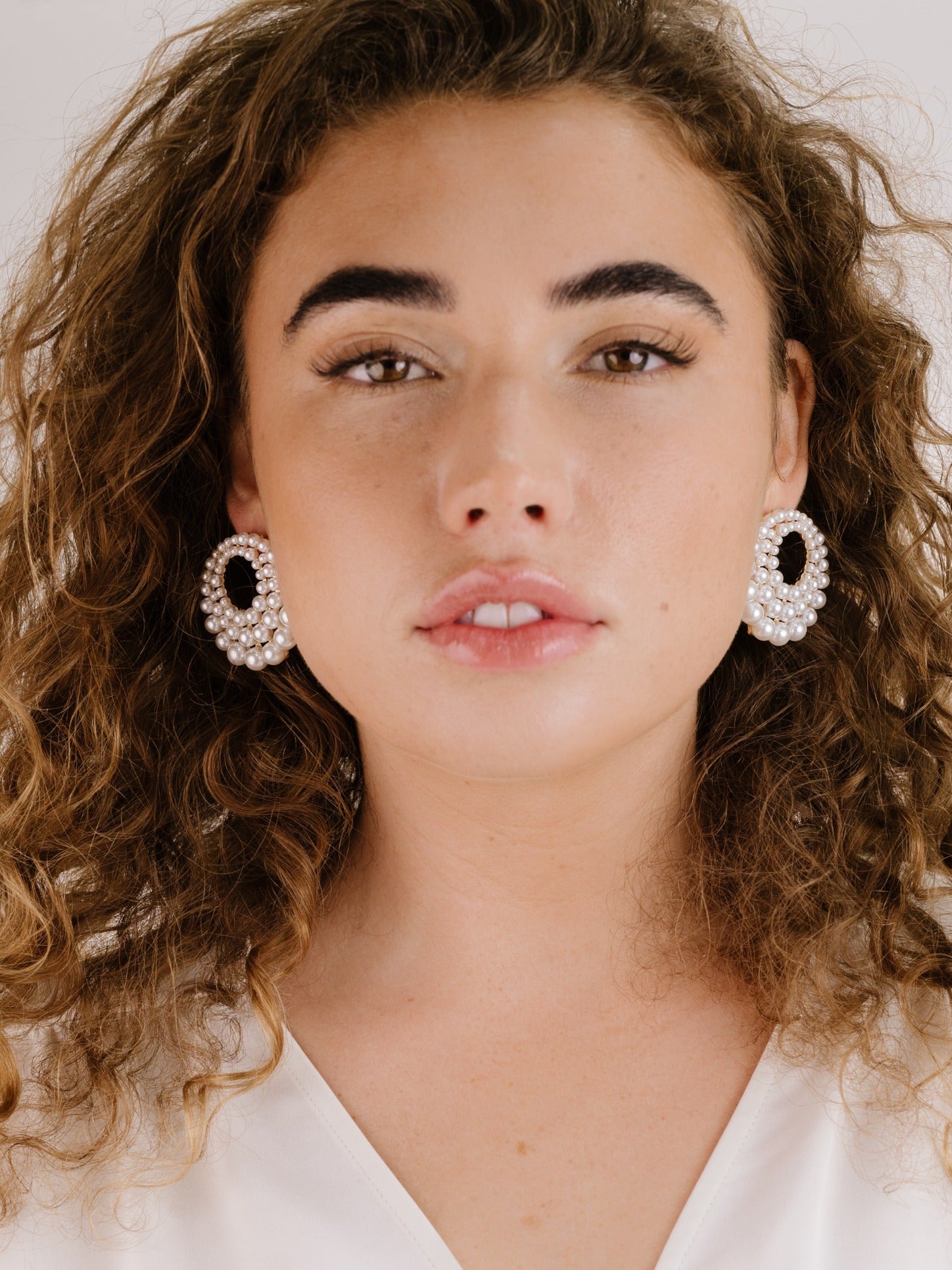 Blushing Pearl Earrings on model 3