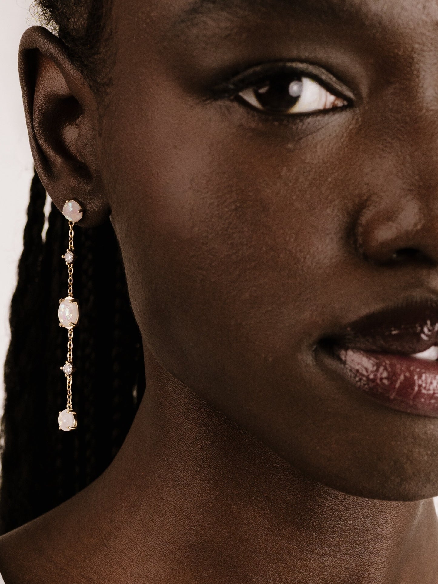 Elegant Opal Sway Dangle Earrings on model