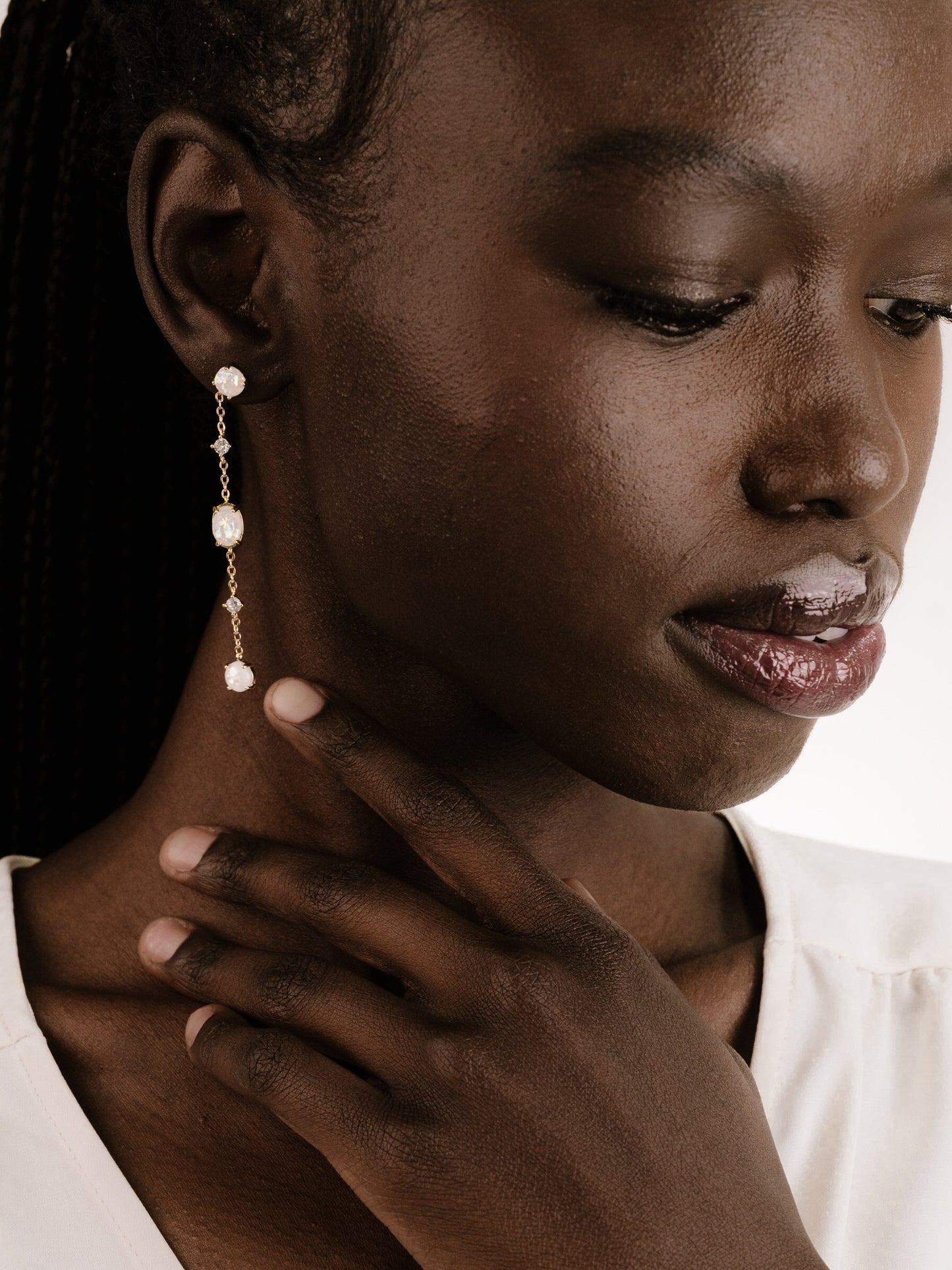 Elegant Opal Sway Dangle Earrings on model 2