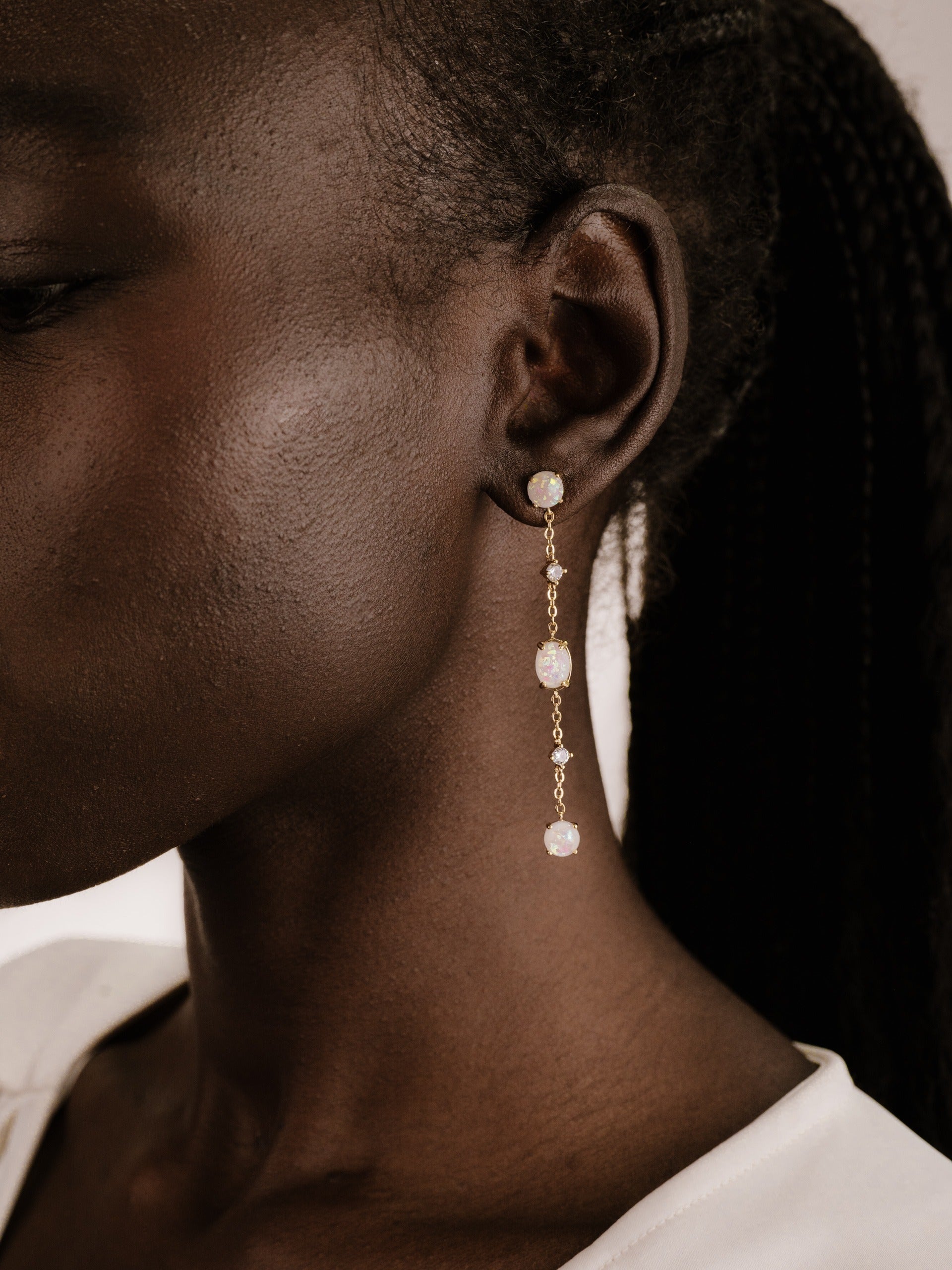 Elegant Opal Sway Dangle Earrings on model 3