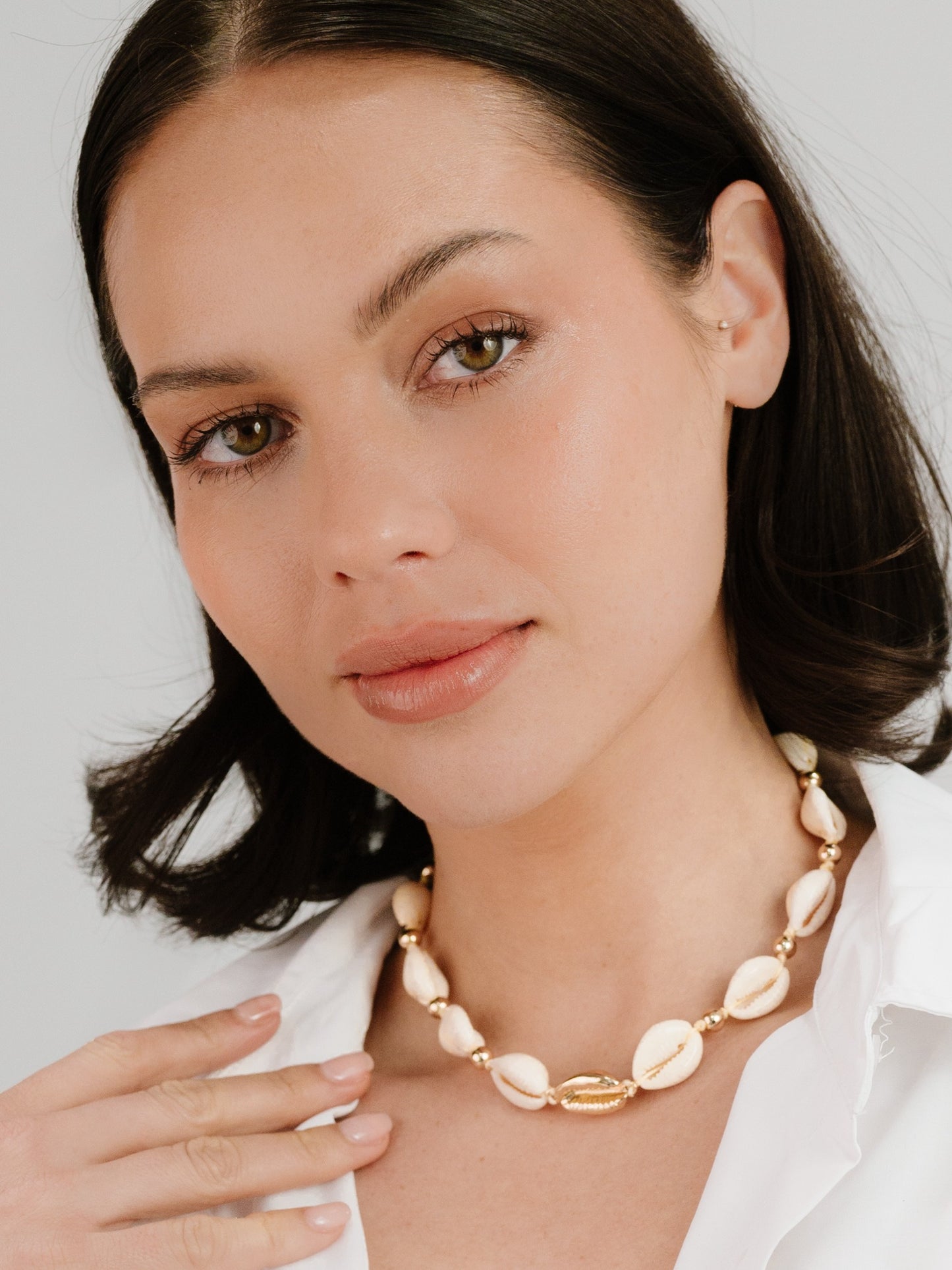 Out to Sea Cowrie Shell Necklace on model 5