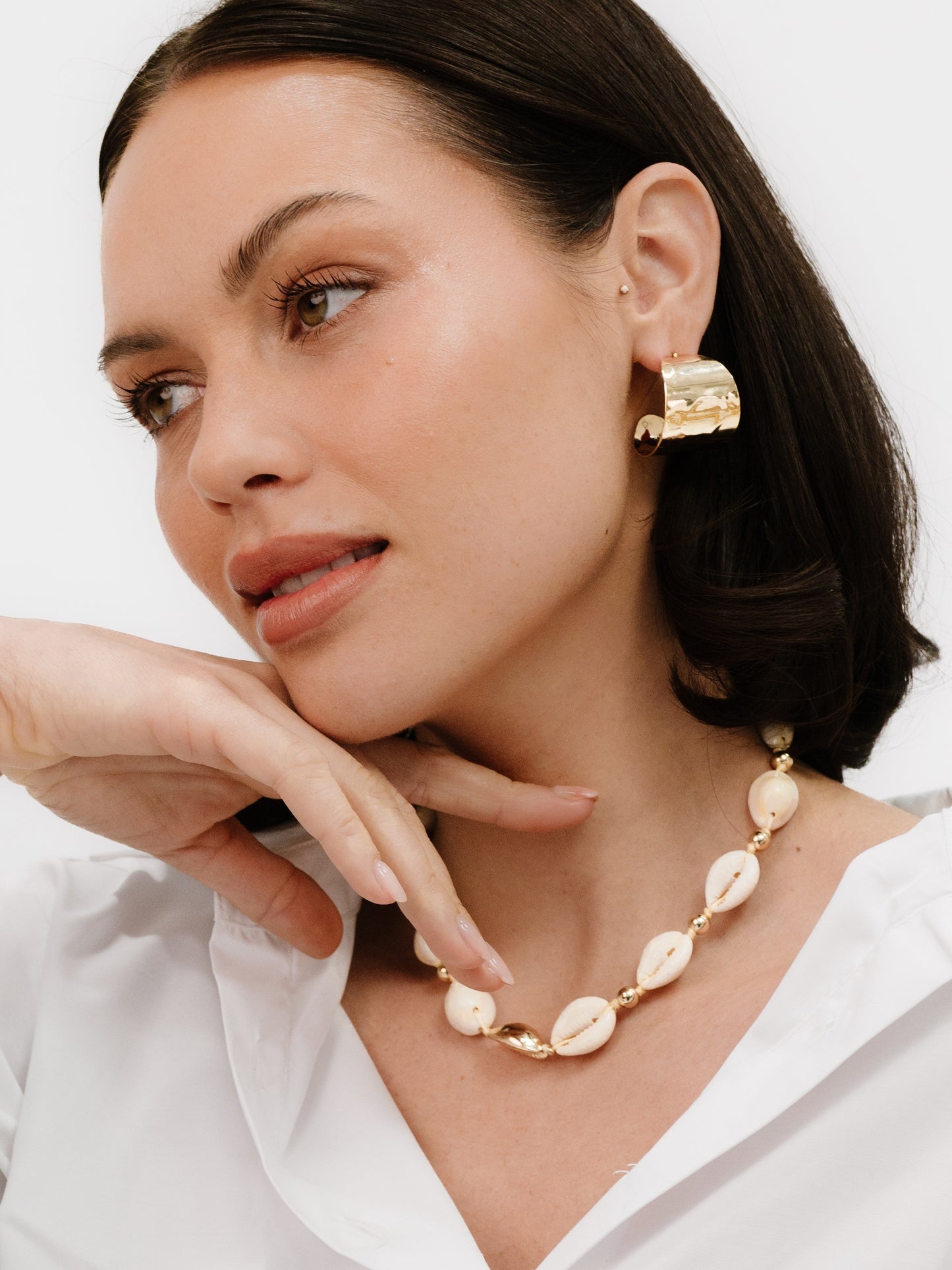 Out to Sea Cowrie Shell Necklace on model 6