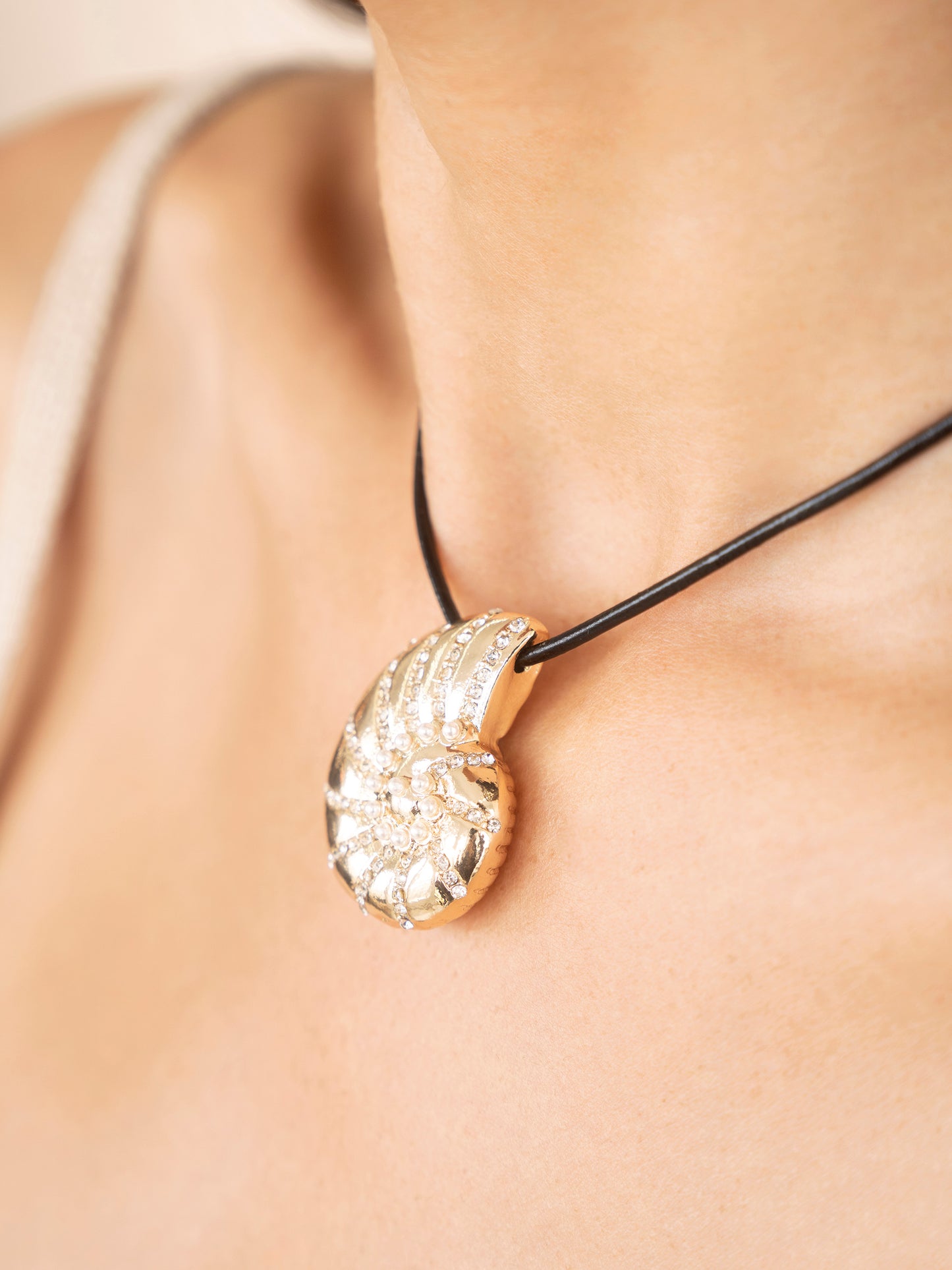 Nautilus Shell Pendant Black Cord Necklace on model 3