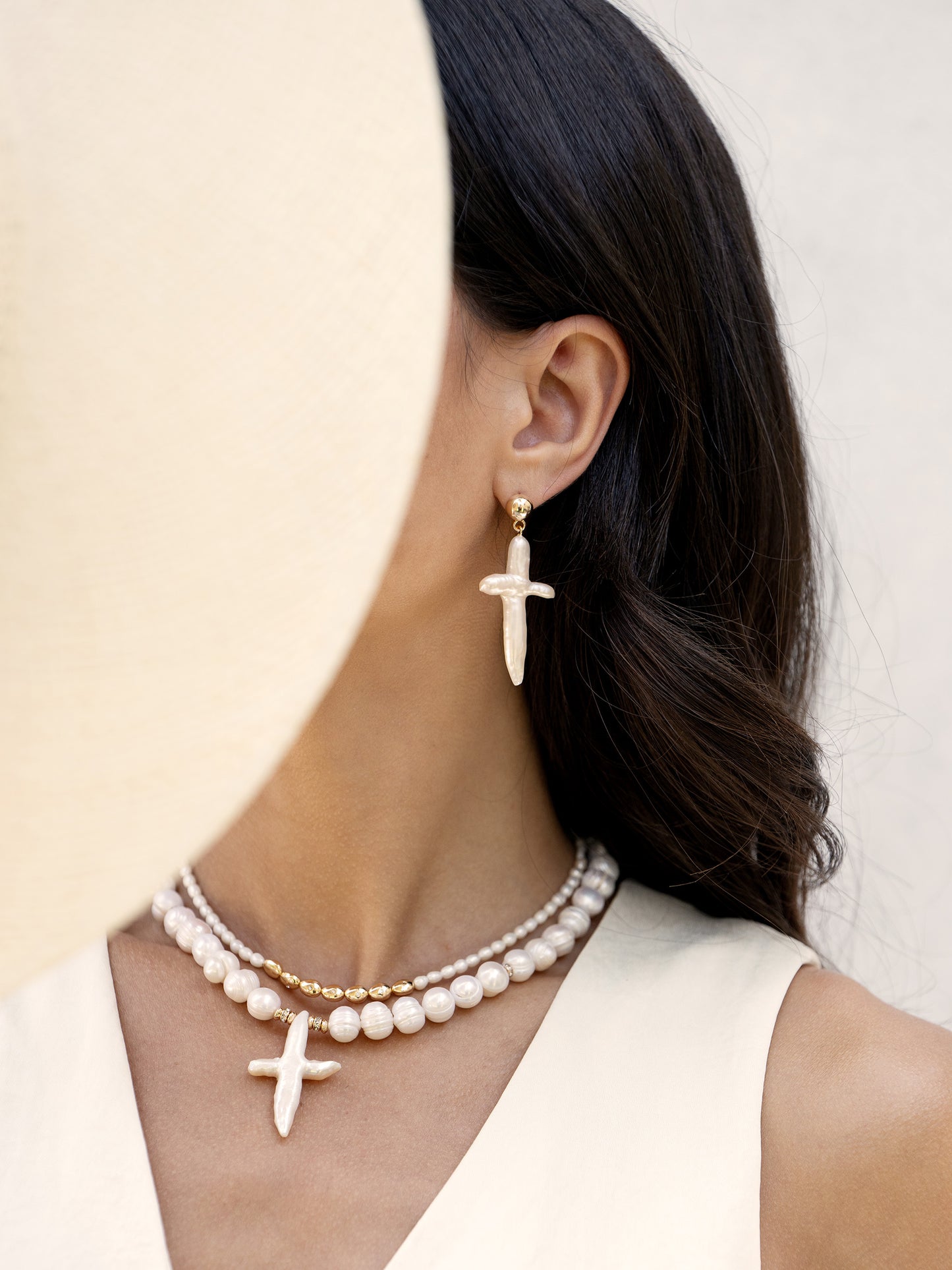 Organic Freshwater Pearl Cross Earrings on model8
