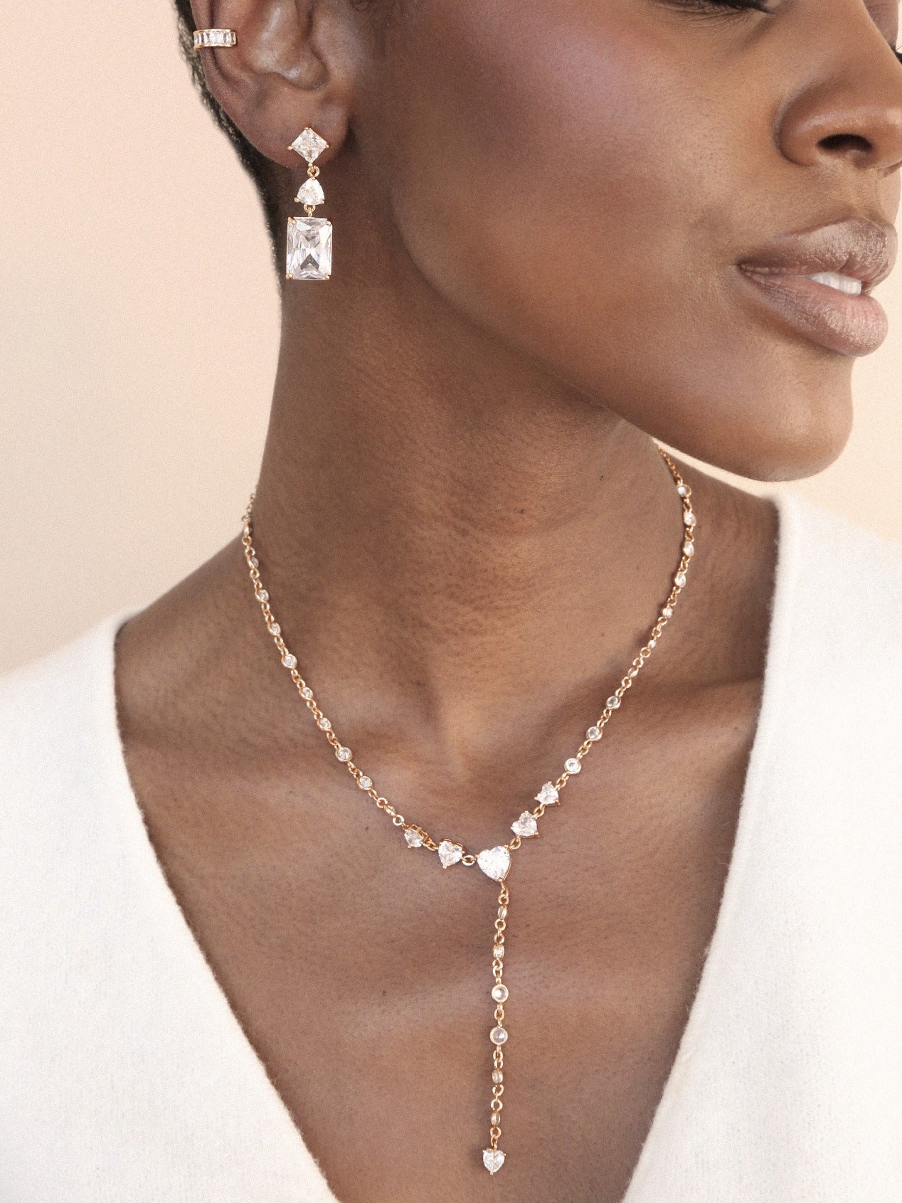 Reflective Crystal Dangle Earrings on model 3