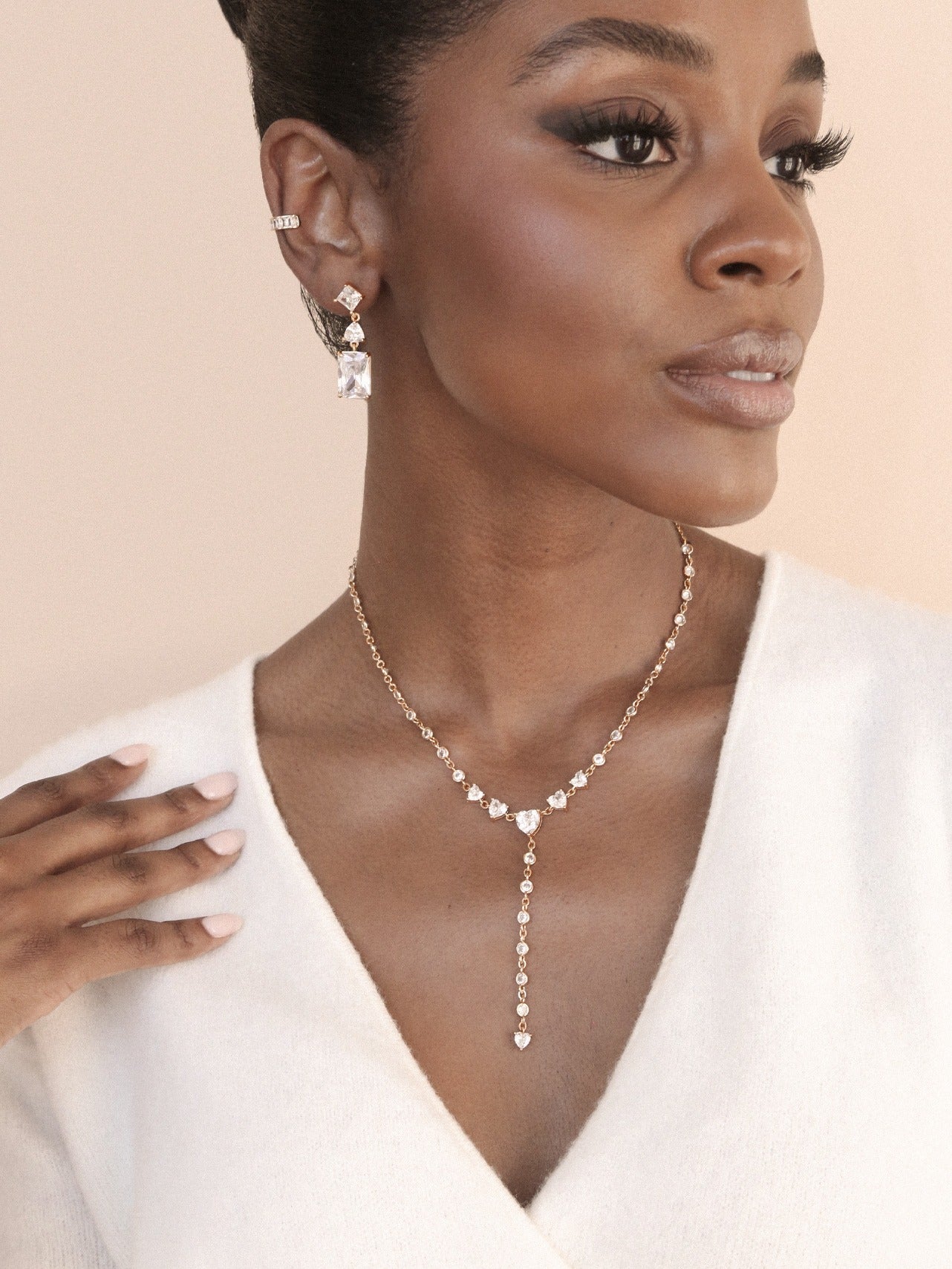 Reflective Crystal Dangle Earrings on model 4