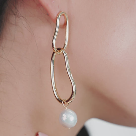 Mara Dangle Pearl Earrings on model in video