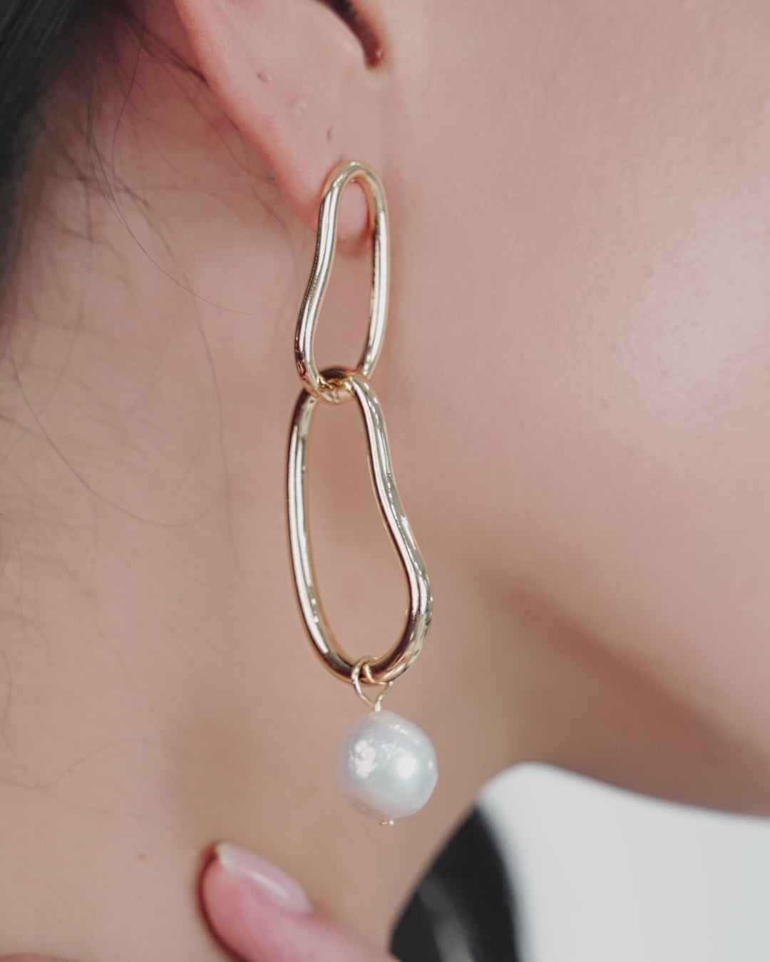 Mara Dangle Pearl Earrings on model in video